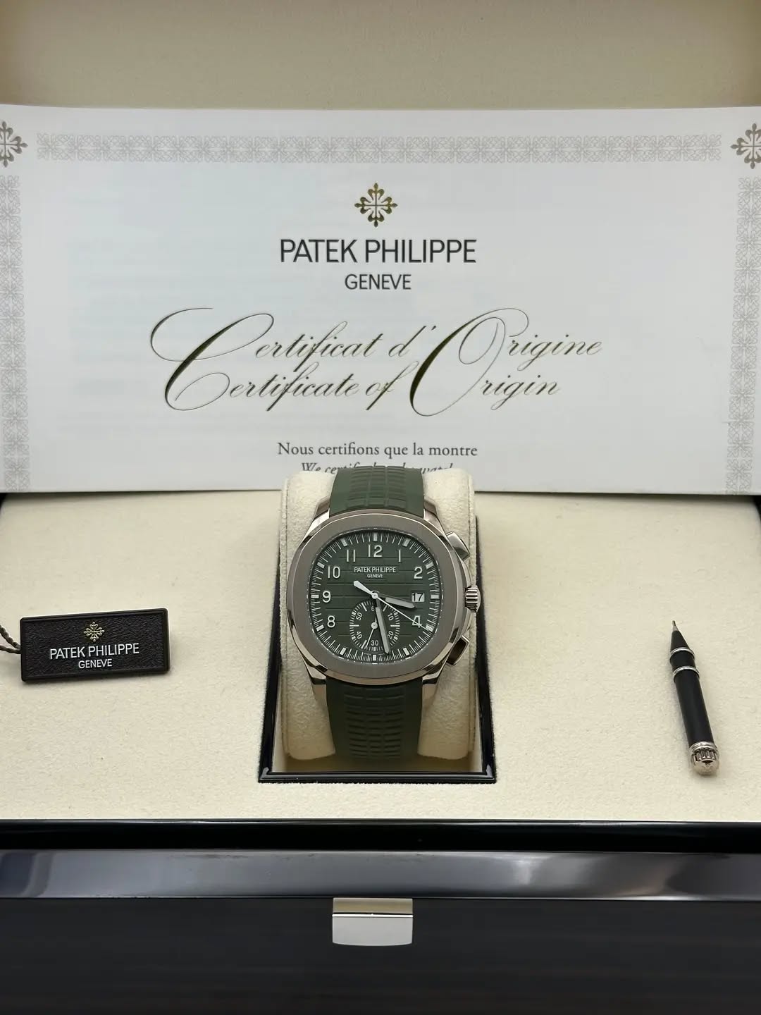 May be an image of wrist watch and text that says 'PATEK PHILIPPE GENEVE CKиKи Derlificate Ortrin Origine rigin Nous certifions que montre IV 12 NTERELIY 10 2 2 9 春 PATEK…