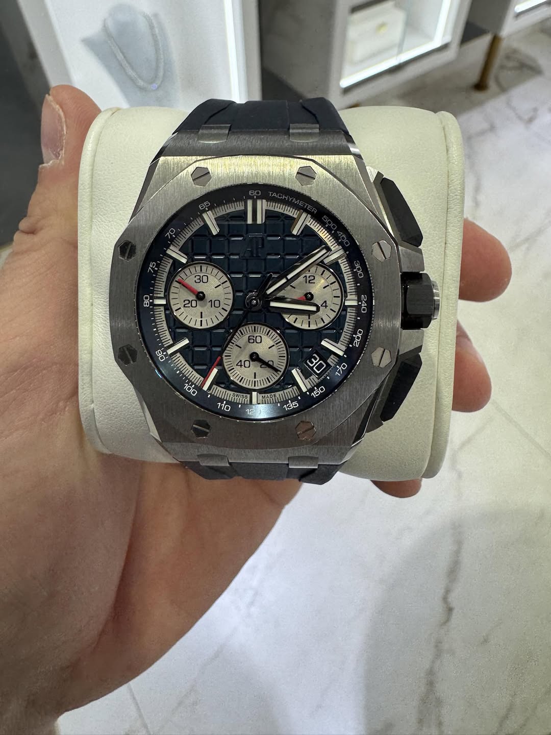 May be an image of wrist watch and text
