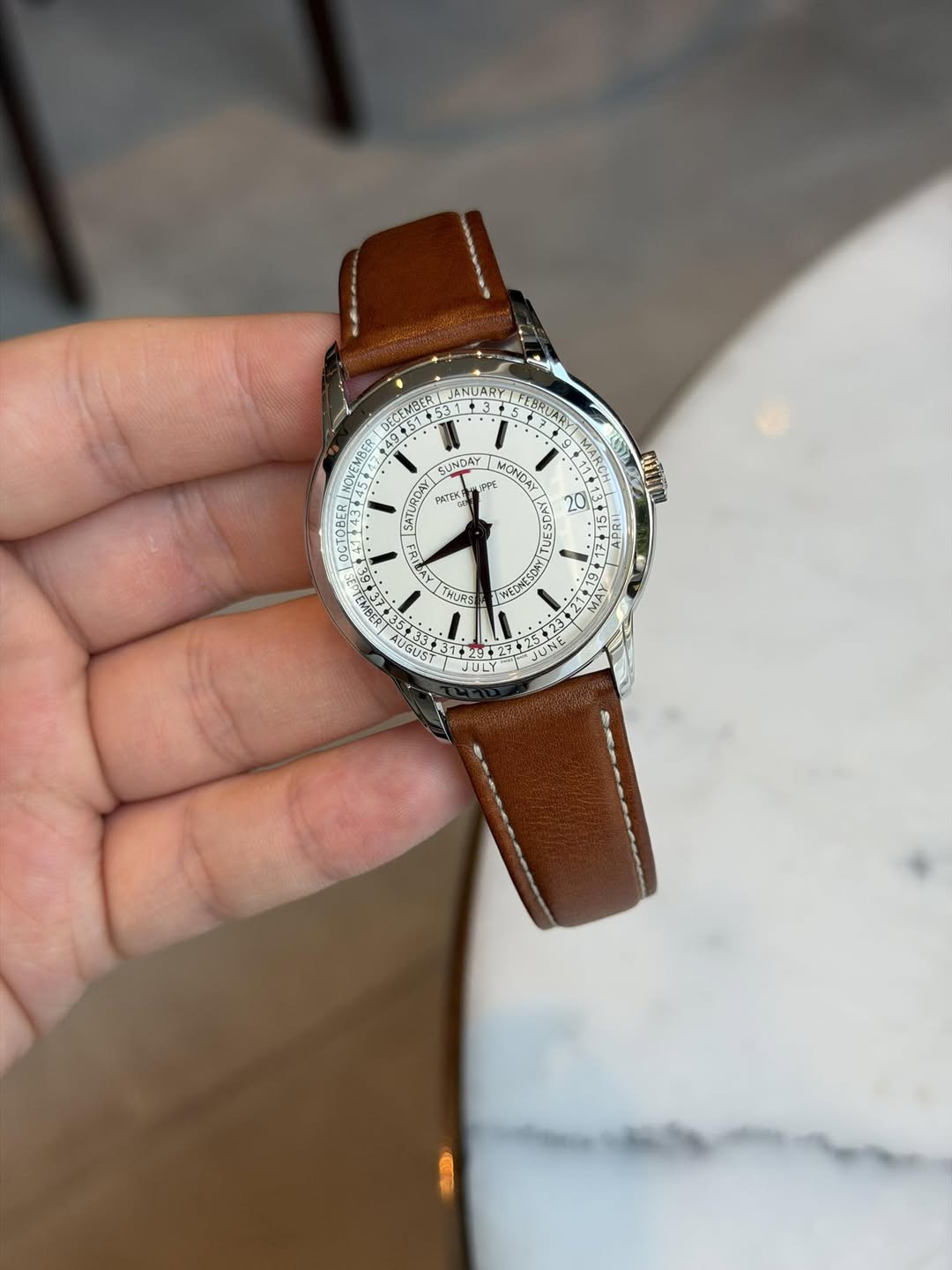May be an image of wrist watch