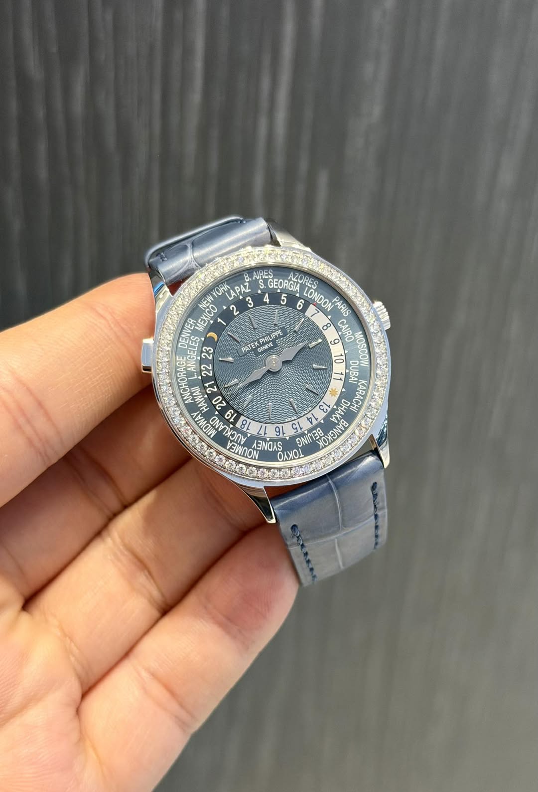 May be an image of wrist watch and text