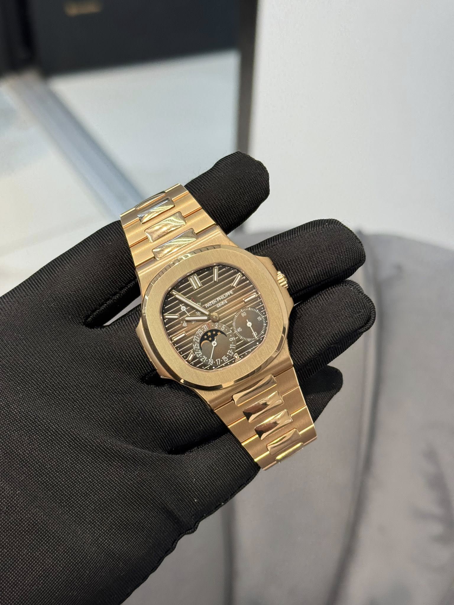 May be an image of wrist watch and text