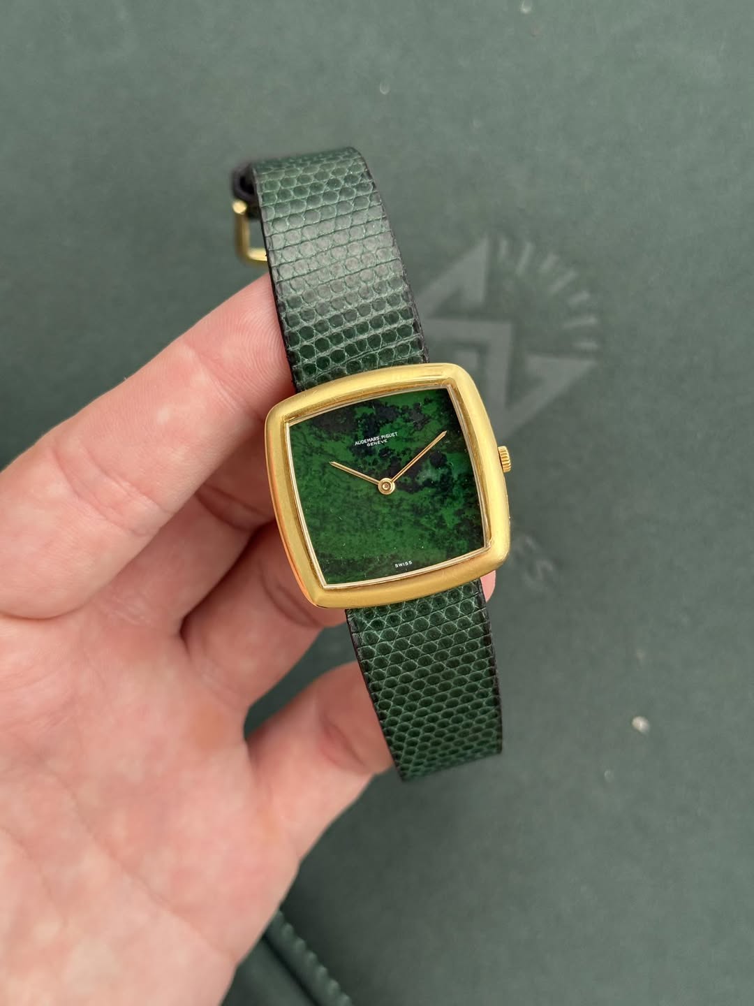 May be an image of wrist watch and saddle-stitched leather