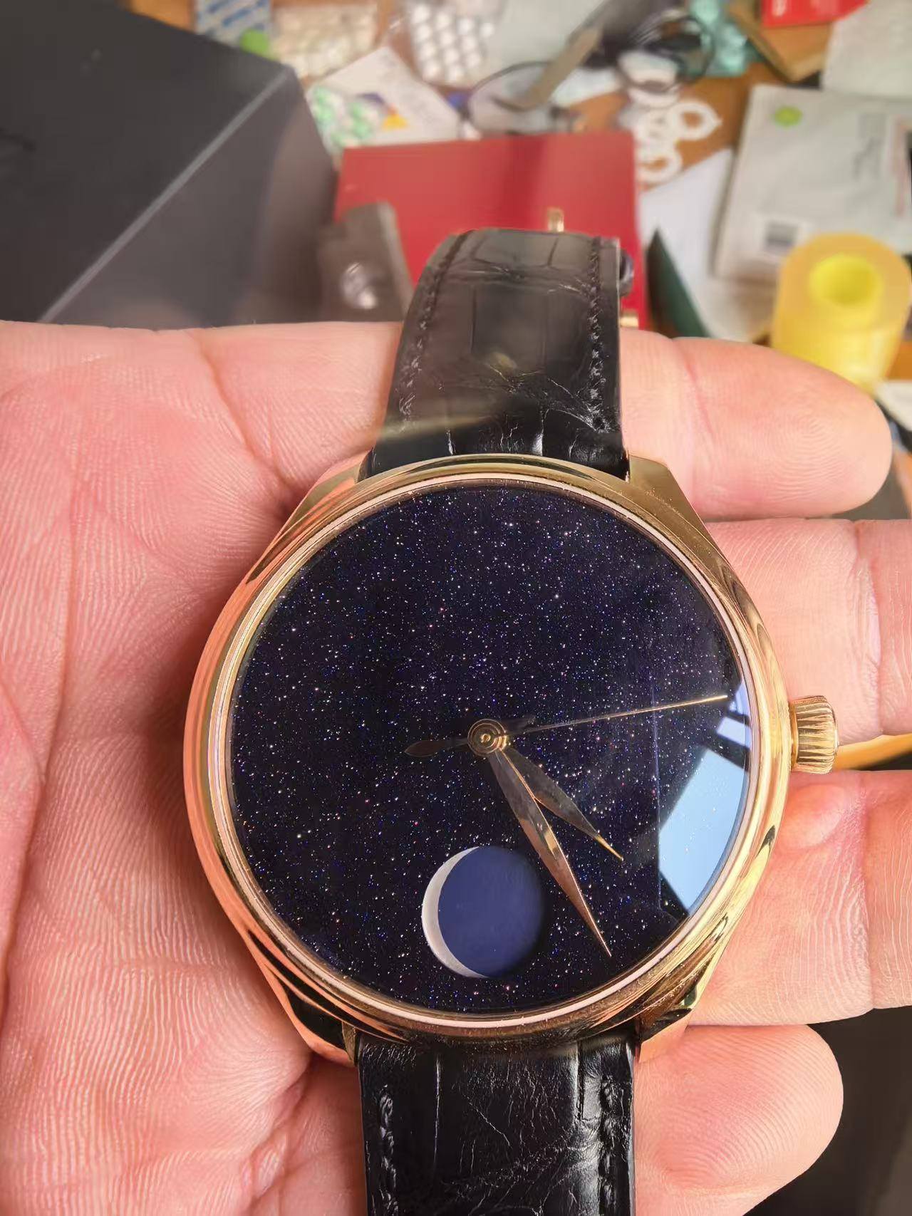 May be an image of wrist watch