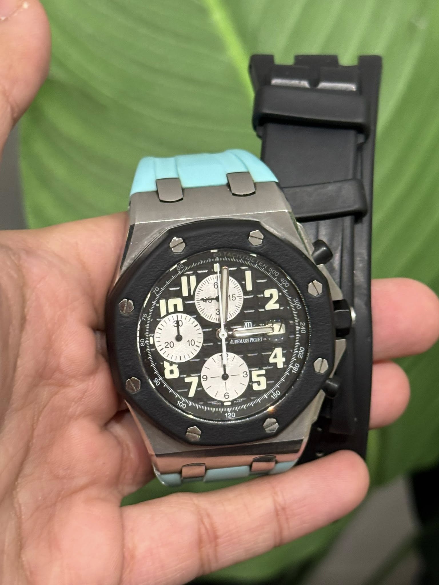 May be an image of digital watch and text
