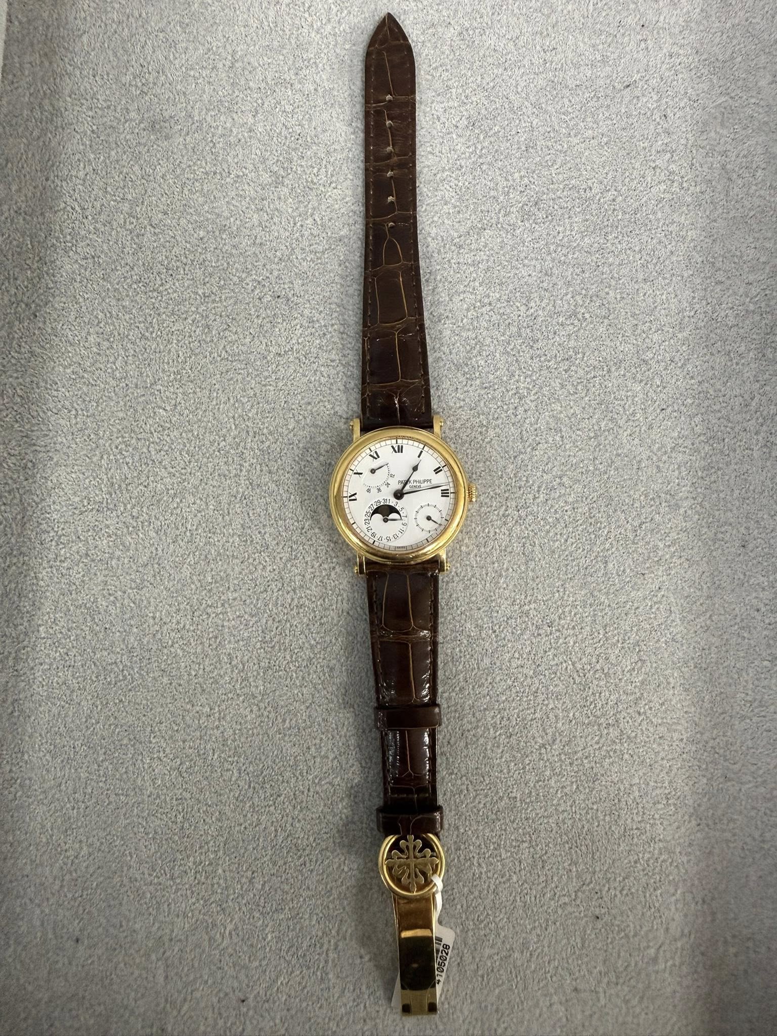 May be an image of leather and wrist watch
