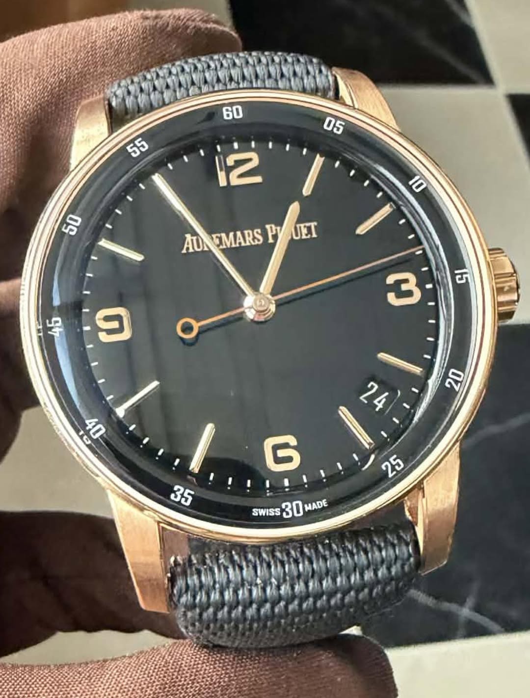 May be an image of digital watch and text that says ' AUMEMARSPUET AU NEMARS P UET 45 ၅ 5 3 1O G 35 !!!!!! SWISS 30HADE 30 MADE'