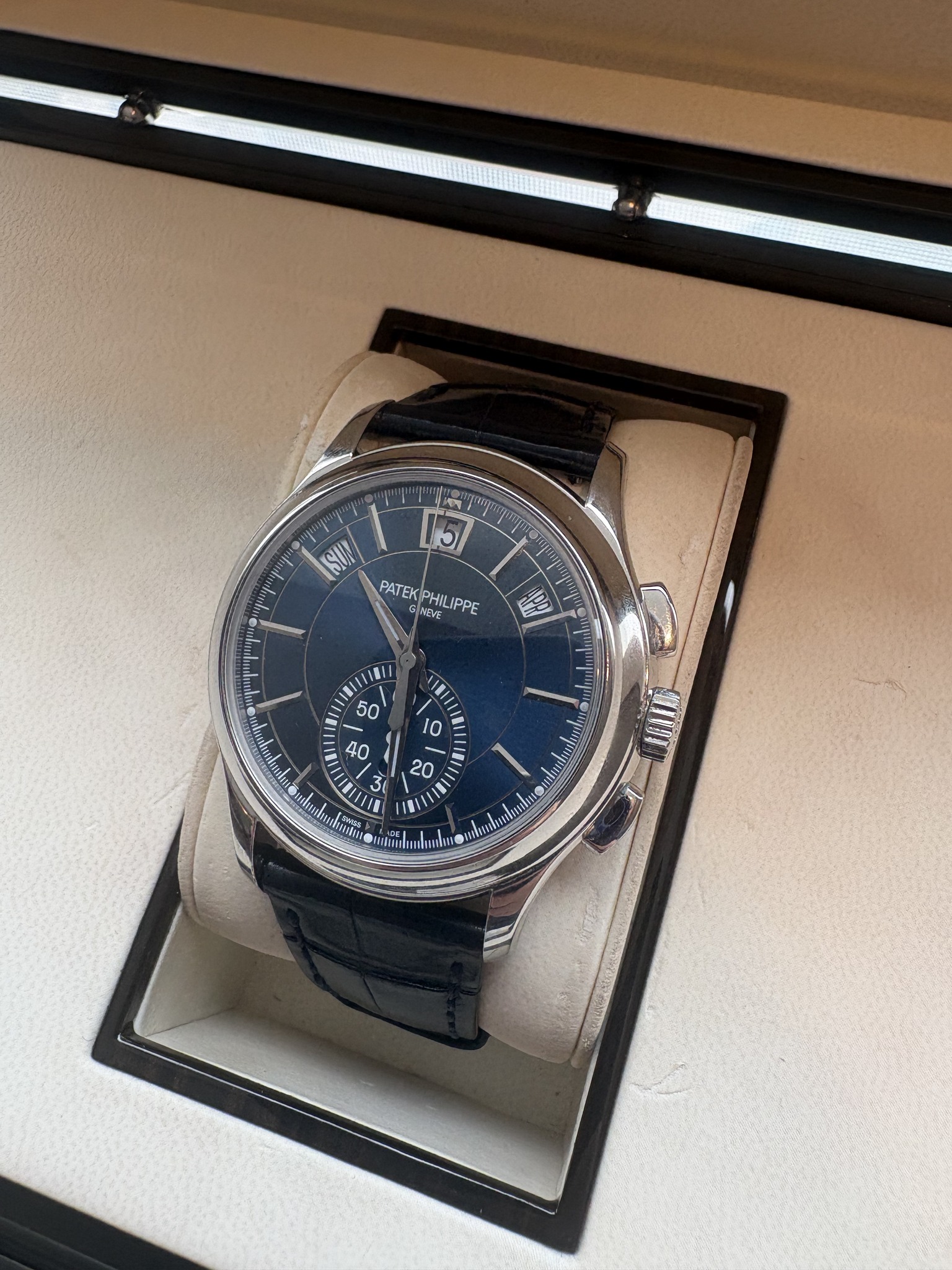 May be an image of wrist watch and text