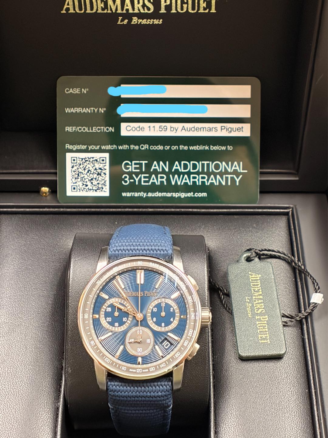 May be an image of wrist watch and text that says 'AUDEMARS rIGUET Le Brassus CASE N" WARRANTY N° REF/COLLECTION Code 11.59 by Audemars Piguet Register your watch with the QR code…
