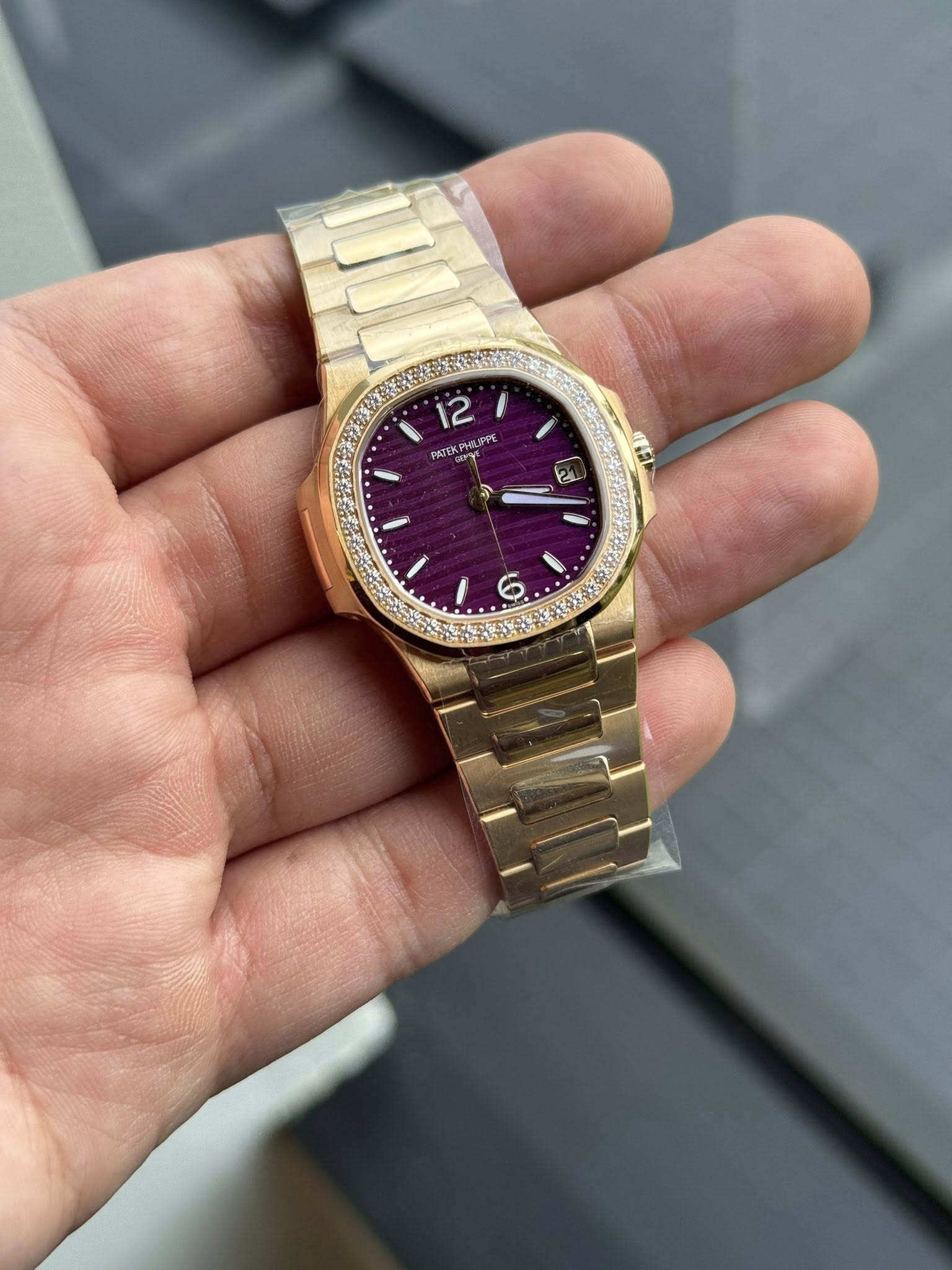 May be an image of wrist watch and text