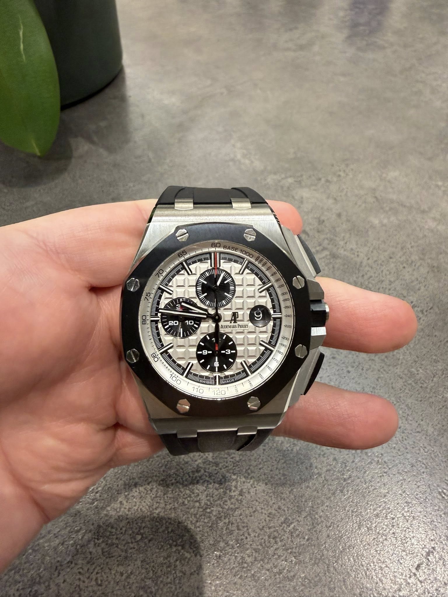 May be an image of wrist watch and text