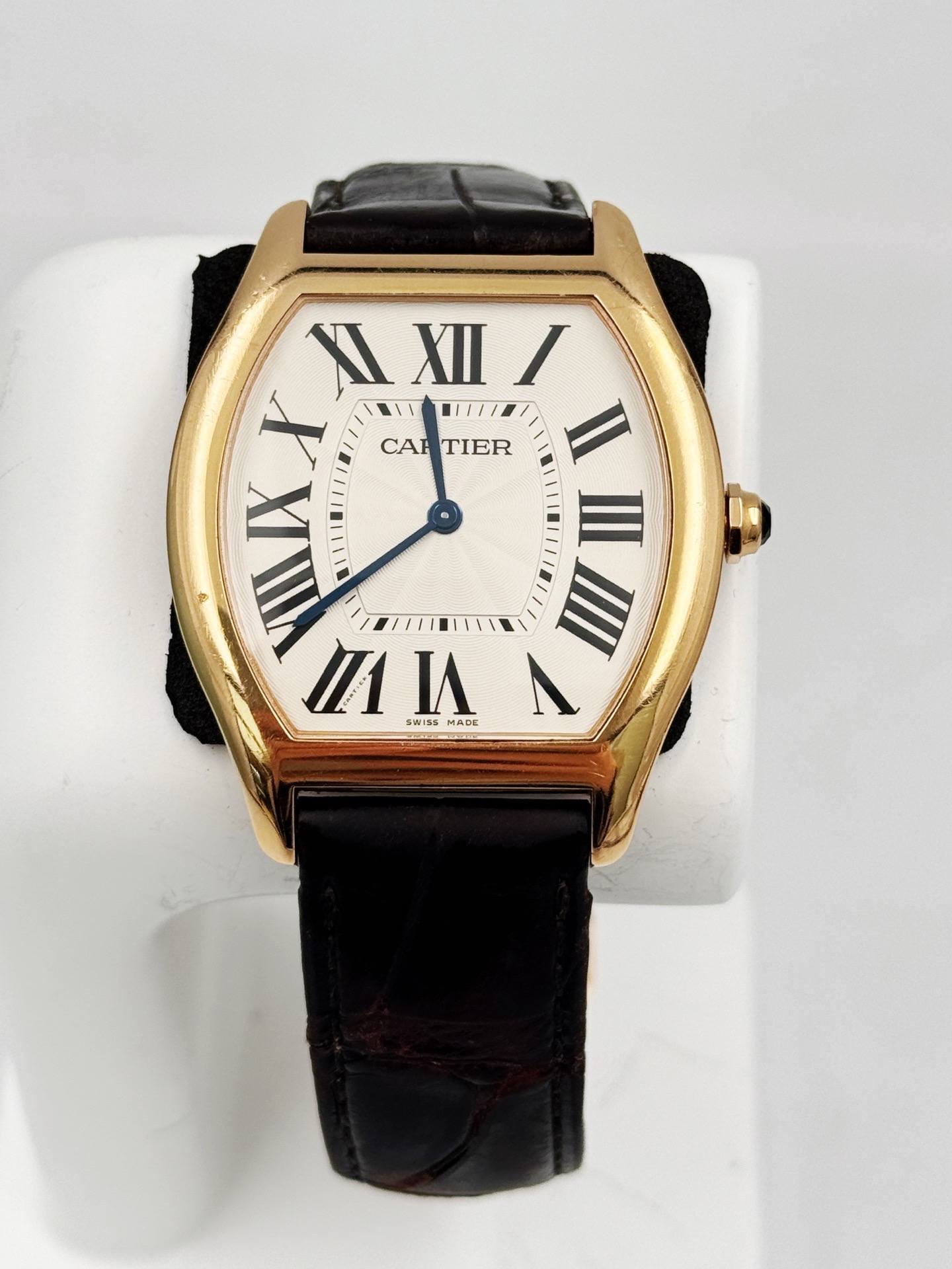 May be an image of wrist watch and text that says 'XI XII IXII/ I X 1//E CAP CAPTIER TIER I VIII n IIAX IX III Ⅲ川 II Οα T uHa ///8//1 SWISS I SMADE A'