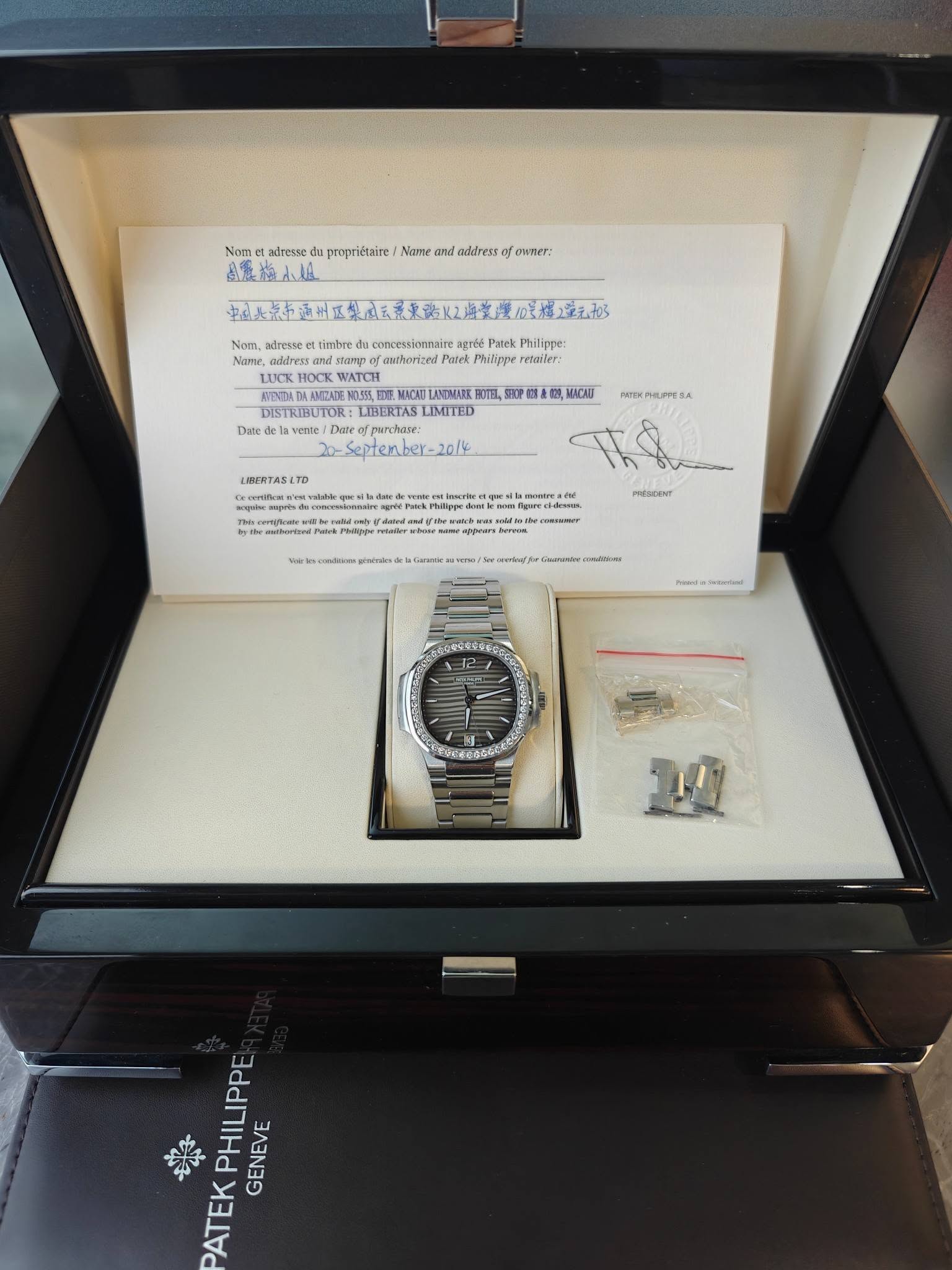 May be an image of wrist watch and text