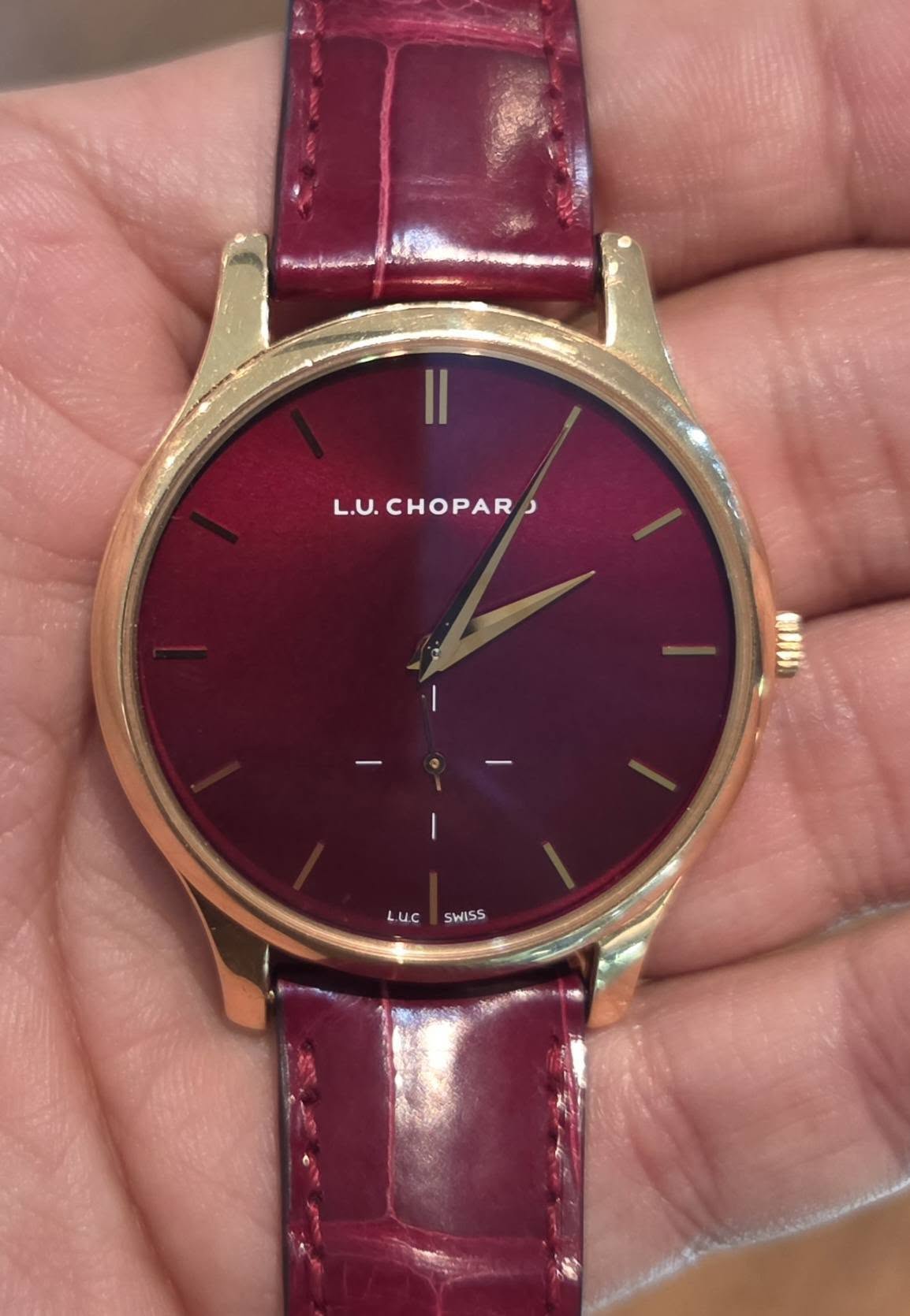 May be an image of wrist watch and text