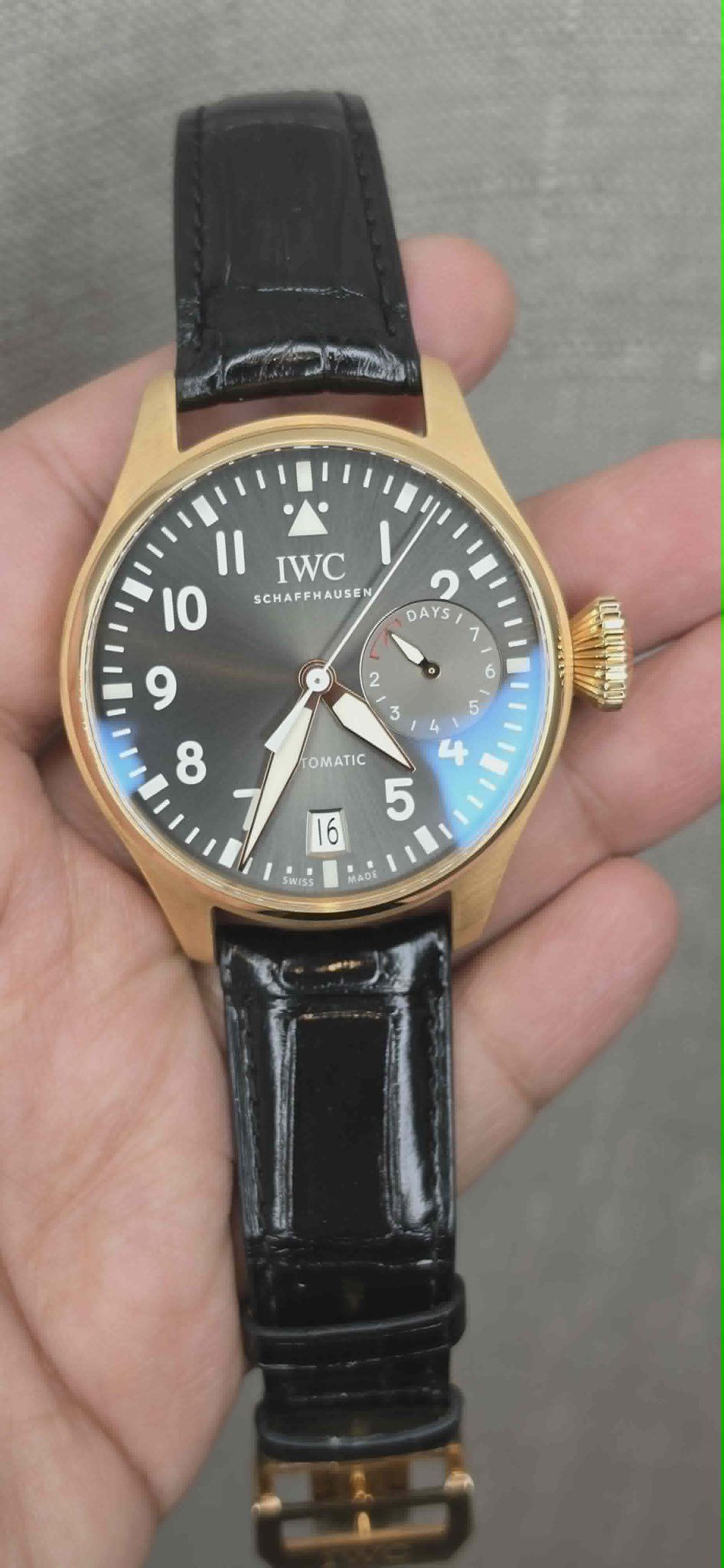May be an image of digital watch and text that says 'Il IWC 10 SCHA SCHAPFHAUSEN AUSEN 9 8 2 DAYS ٥ 2 3 5 OMATIC 4 5 16'