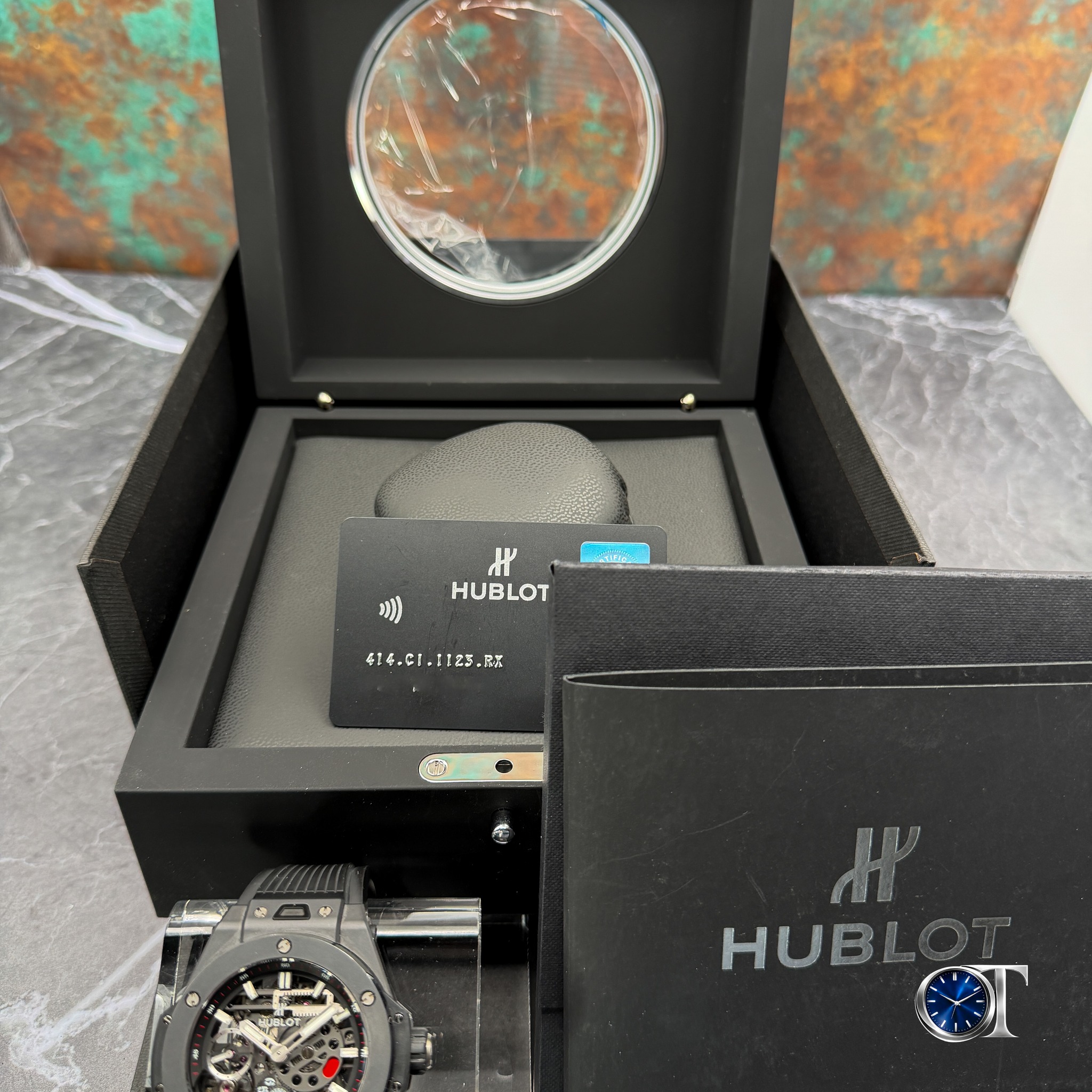 May be an image of wrist watch and text