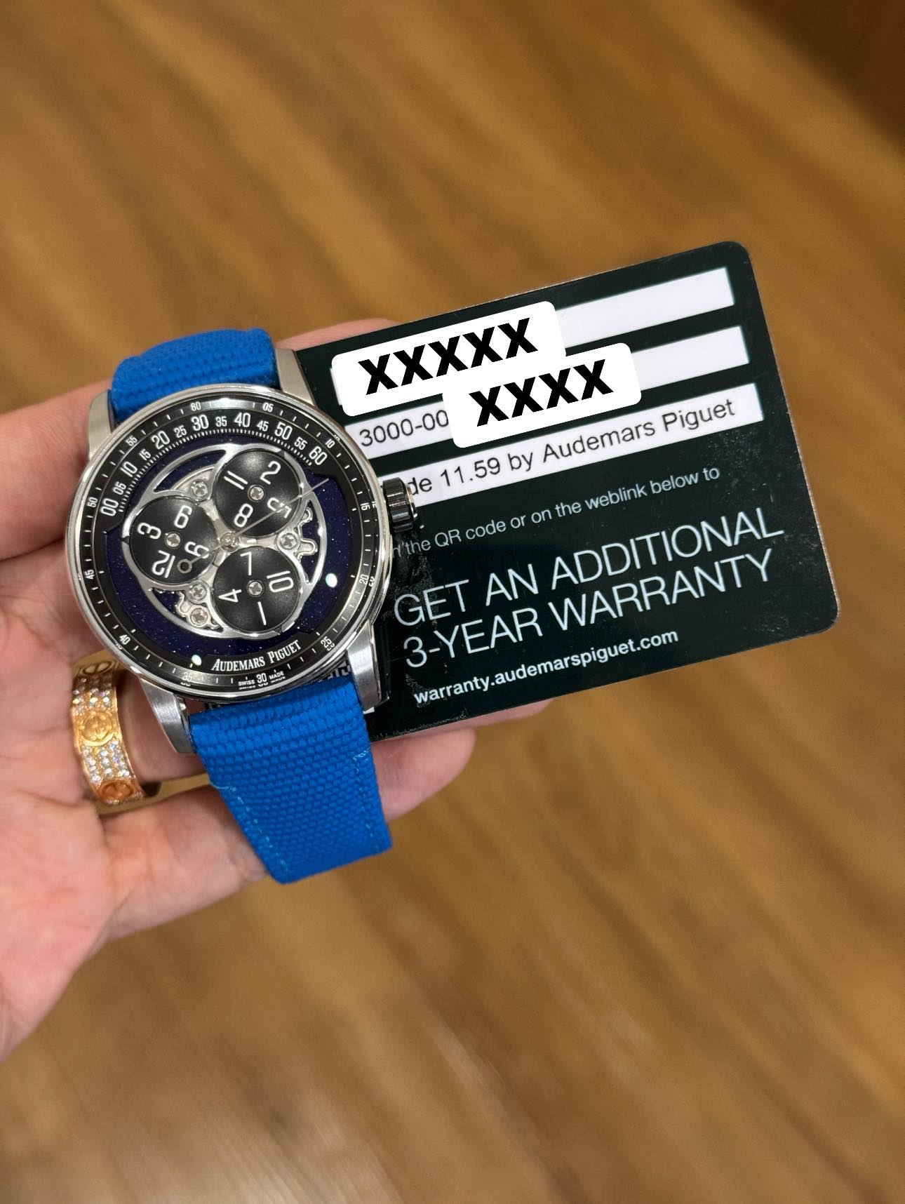 May be an image of wrist watch and text that says '4 U 00 6 က 21 CC 8 ር 9 1 ٣ ذ 0 XXXXX XXXX 3000-00 de by Audemars Piguet or O on the QR code or GET AN ADDITIONAL the weblink…
