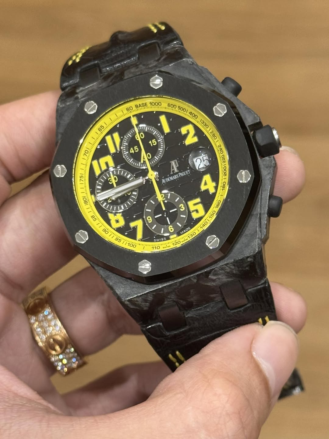 May be an image of wrist watch and text