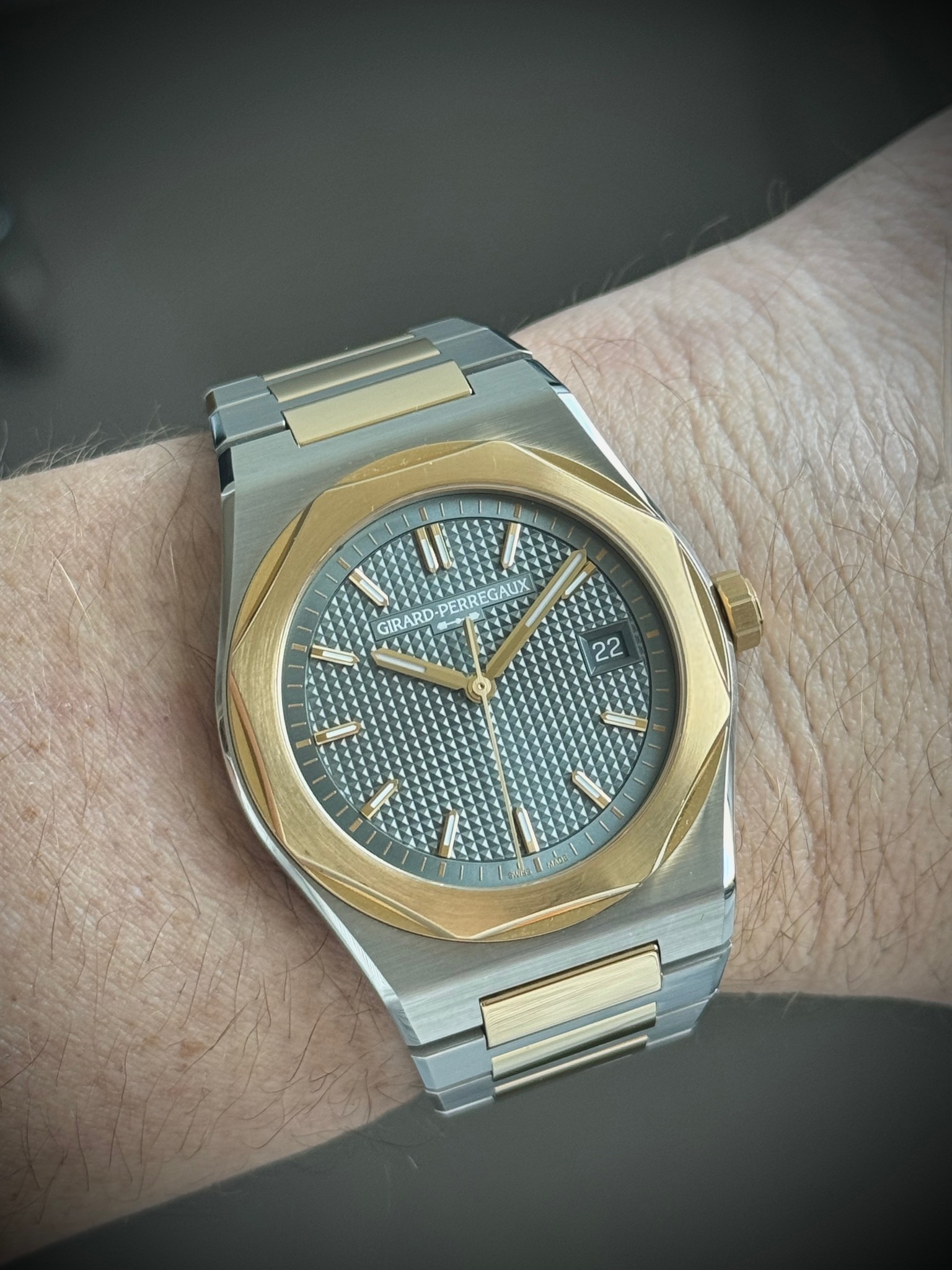 May be an image of wrist watch and text