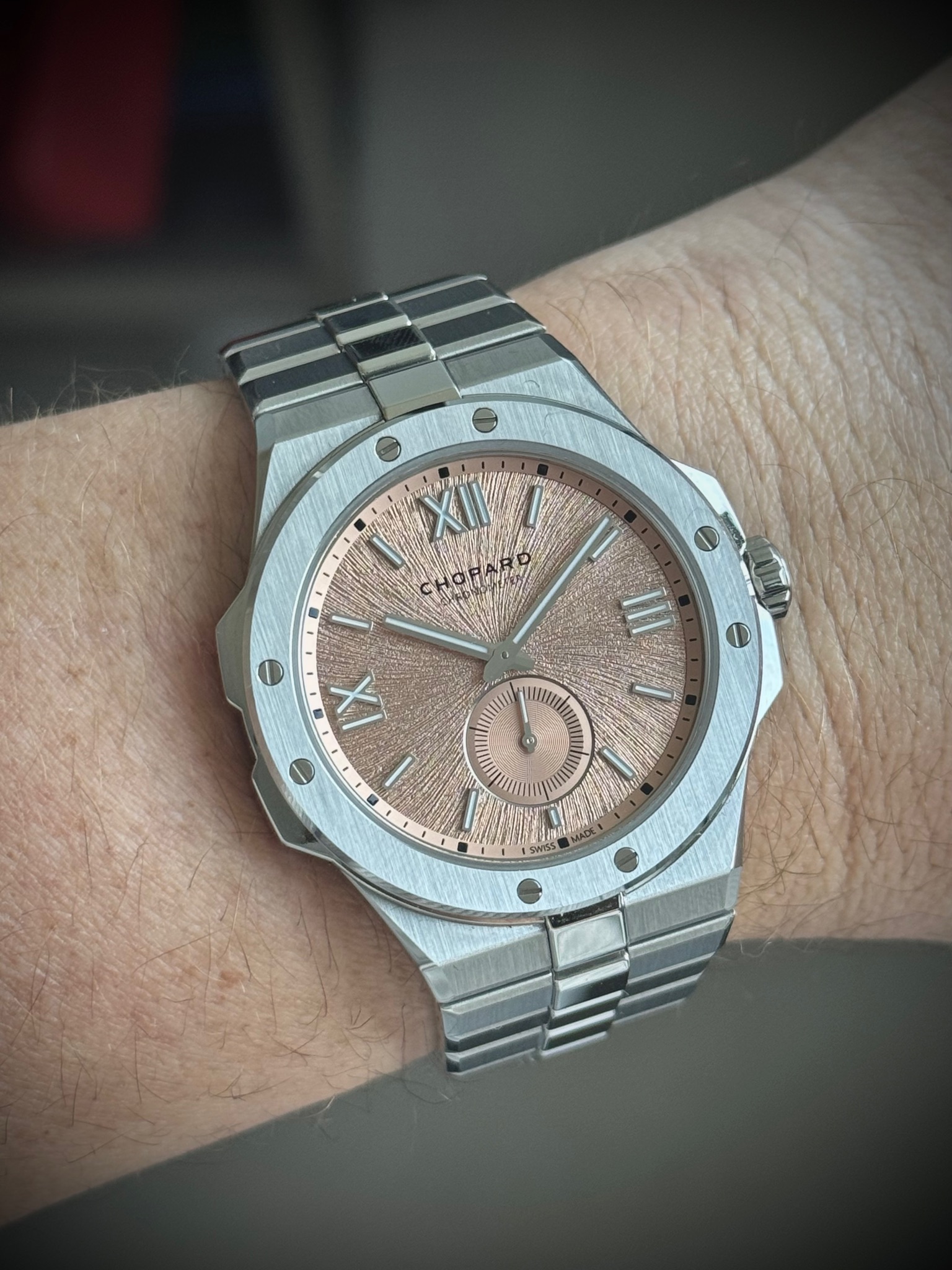 May be an image of wrist watch and text that says 'H0 XII III UU IX 3'