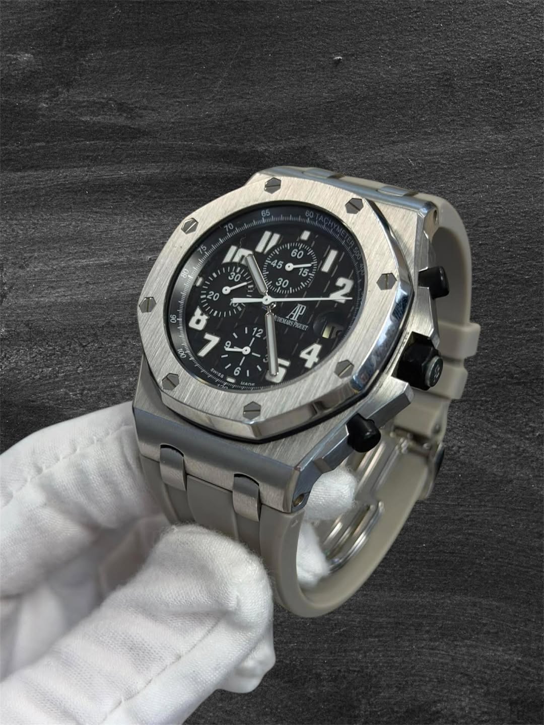 May be an image of wrist watch and text