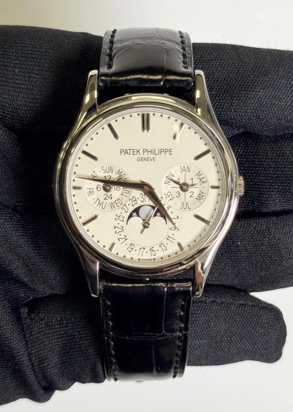 May be an image of wrist watch and text