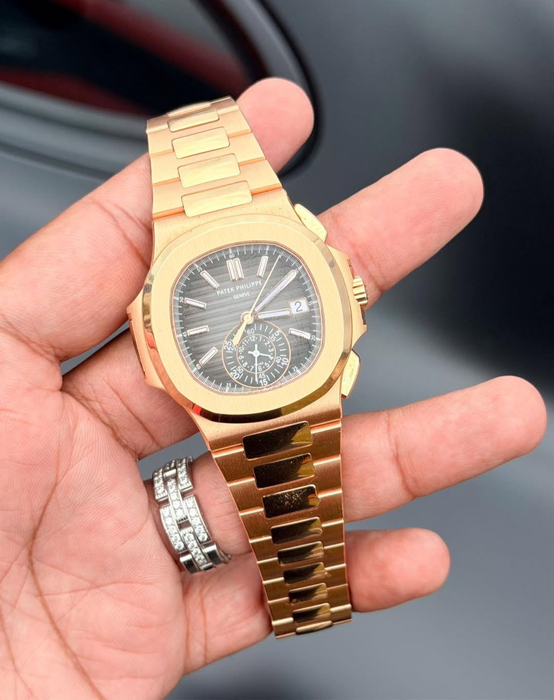May be an image of wrist watch and text
