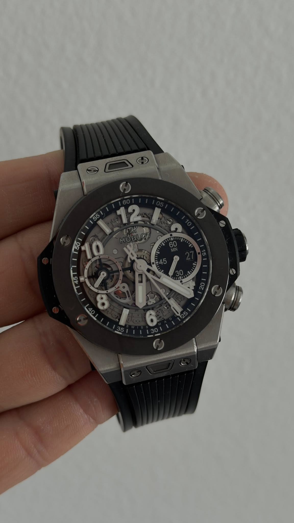 May be an image of wrist watch and text