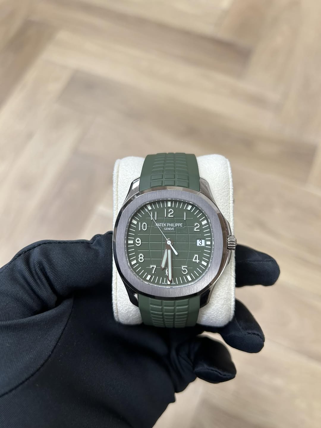 May be an image of wrist watch and text