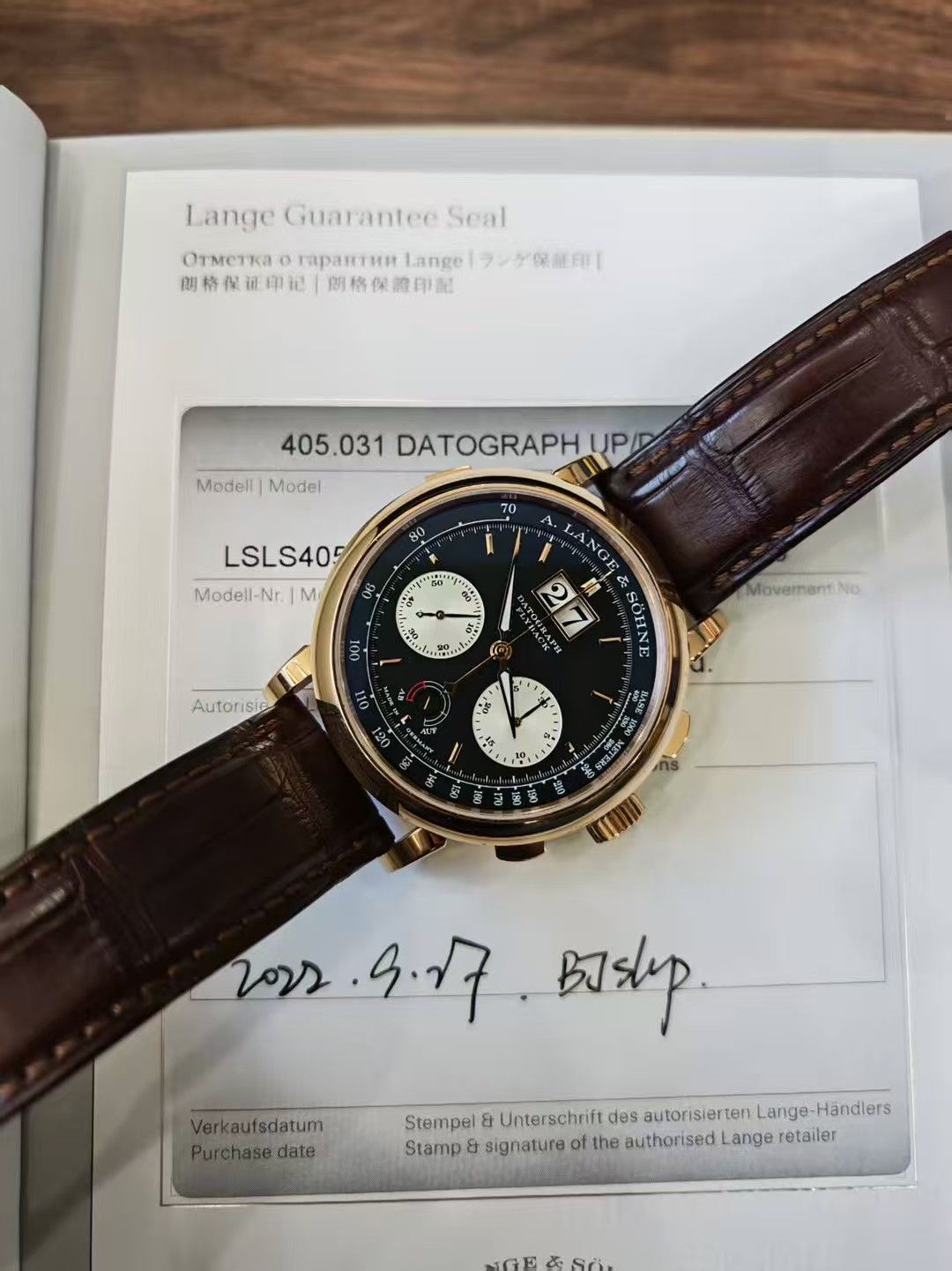 May be an image of wrist watch and text