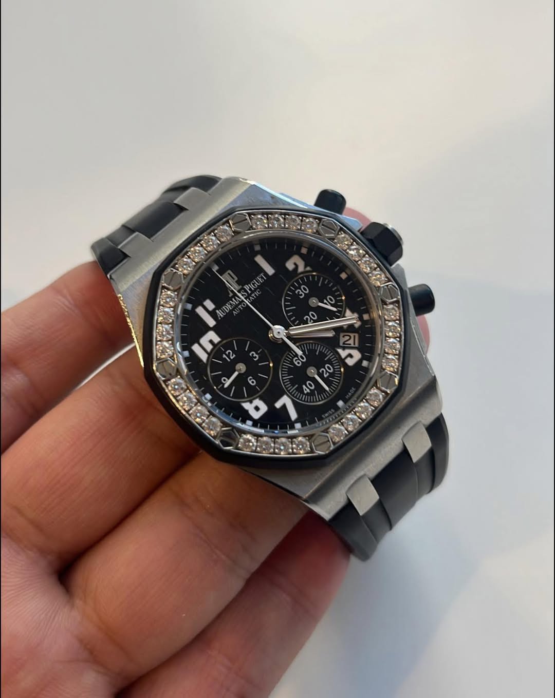 May be an image of wrist watch and text that says '30 PIGUE UD UDE UDI In 12 20 " '