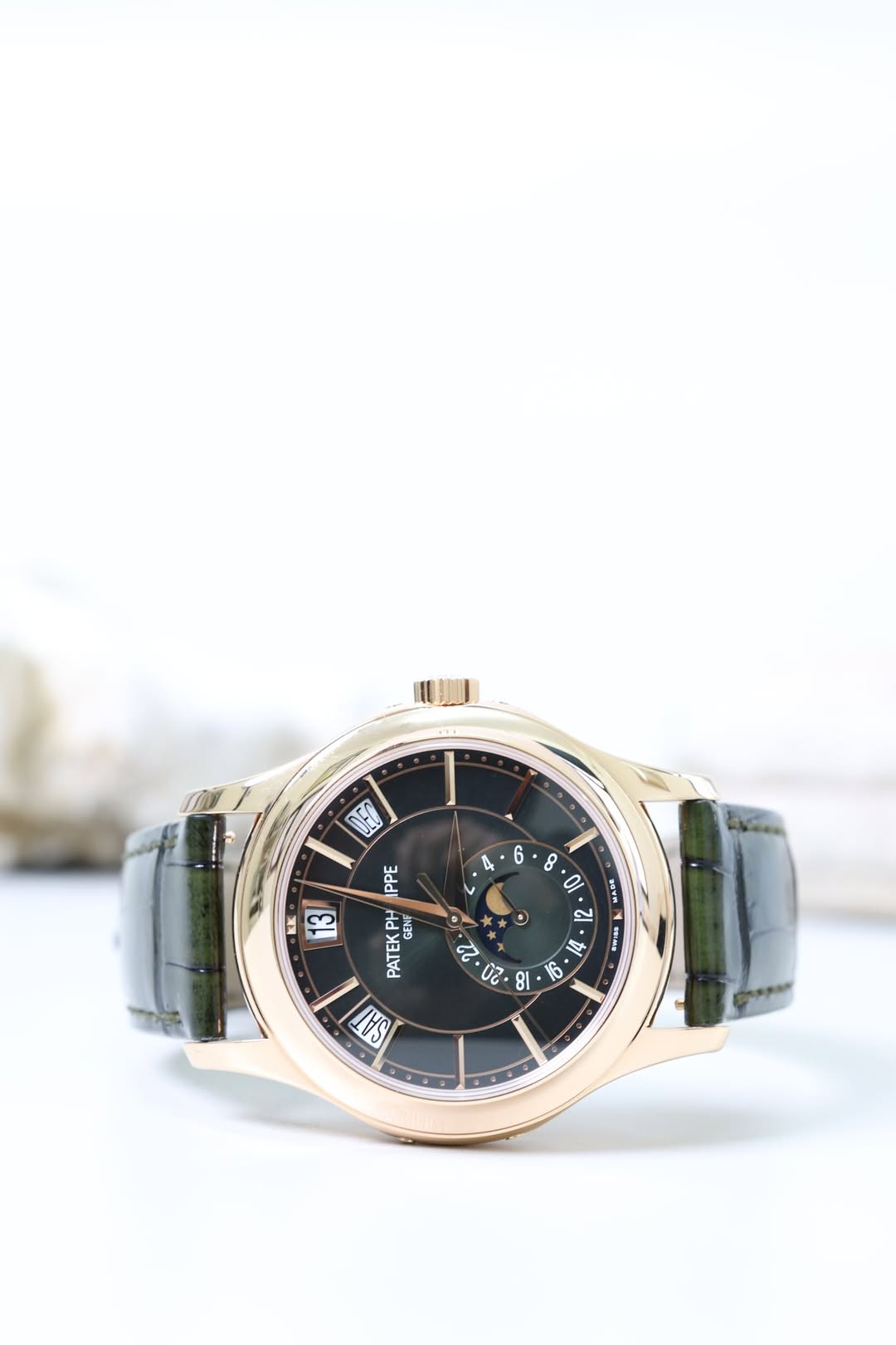 May be an image of wrist watch and text