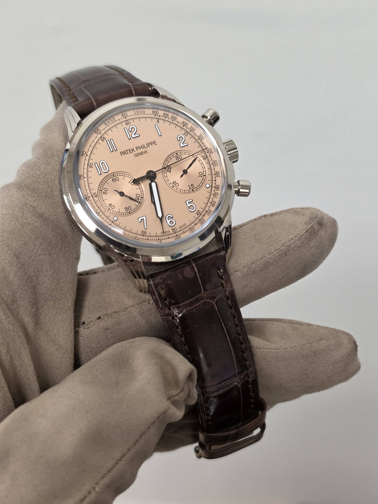 May be an image of wrist watch and text