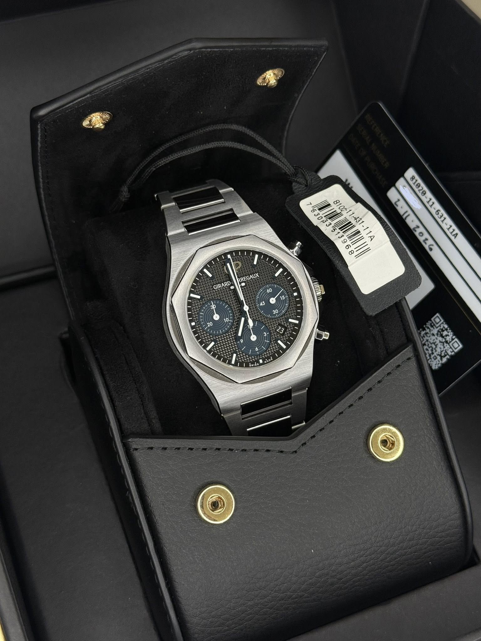 May be an image of wrist watch and text