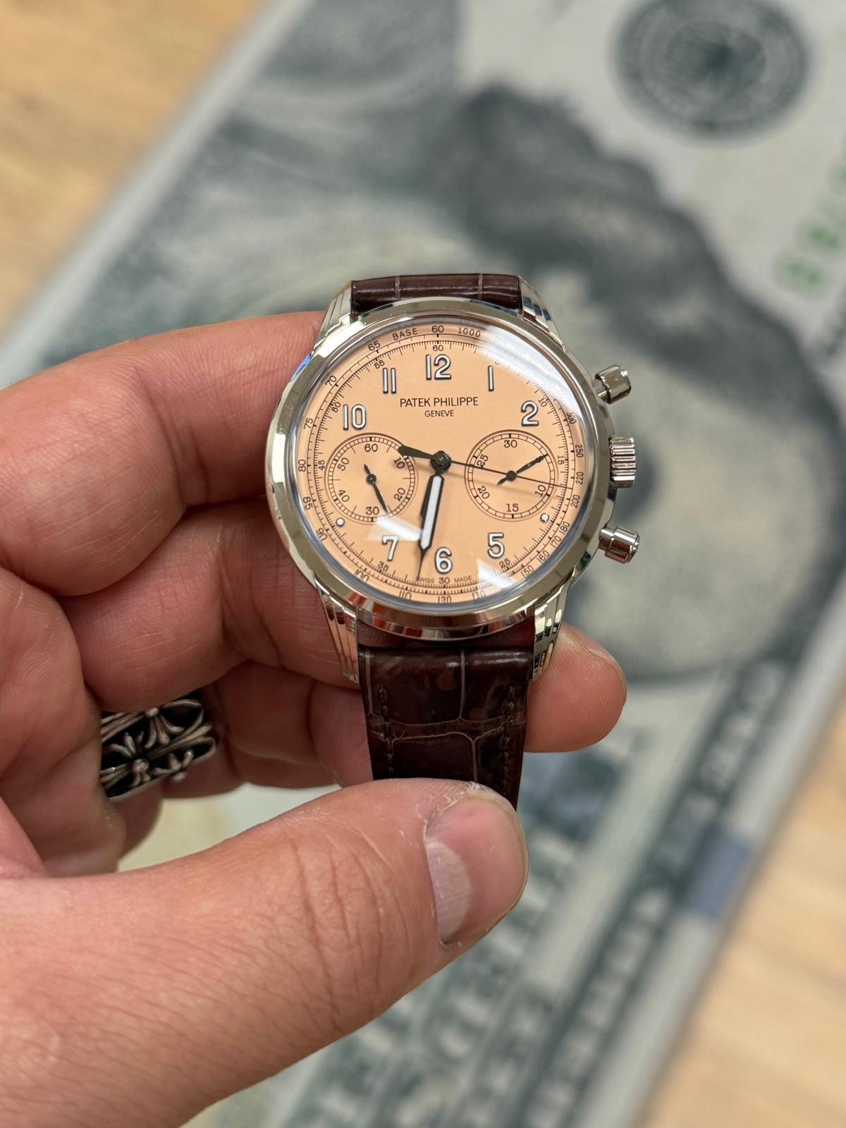 May be an image of wrist watch and text