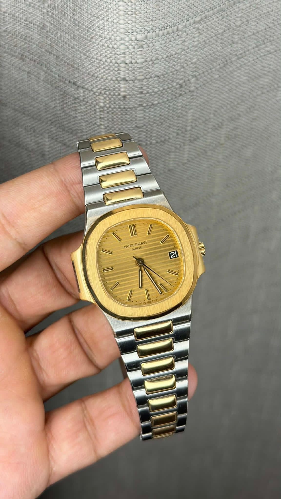 May be an image of wrist watch and text