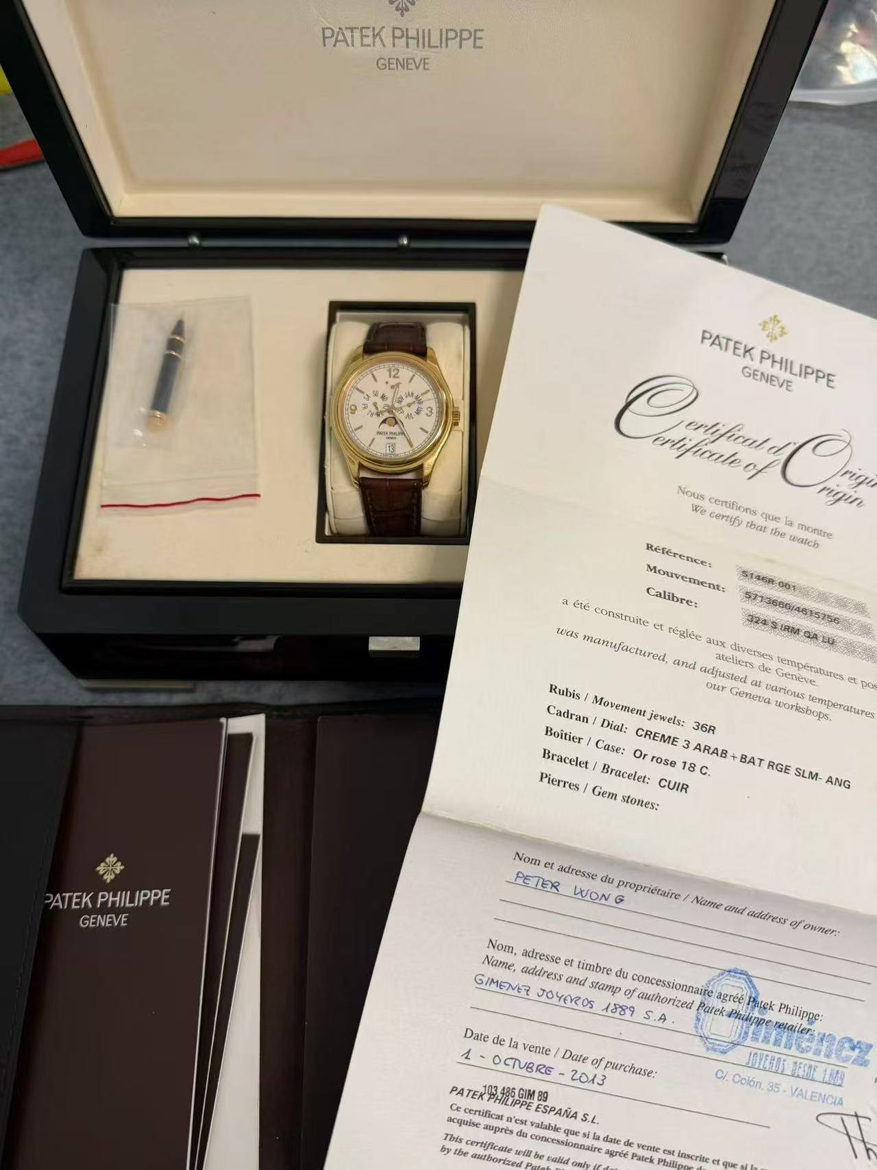May be an image of wrist watch and text that says 'PATEK PHILIPPE GENEVE 12 PATEK ብን GENEVE PHILIPPE erlificdle Nous certifions que cepH6y tbat Réference: ualch Monvement: ว1ดี…