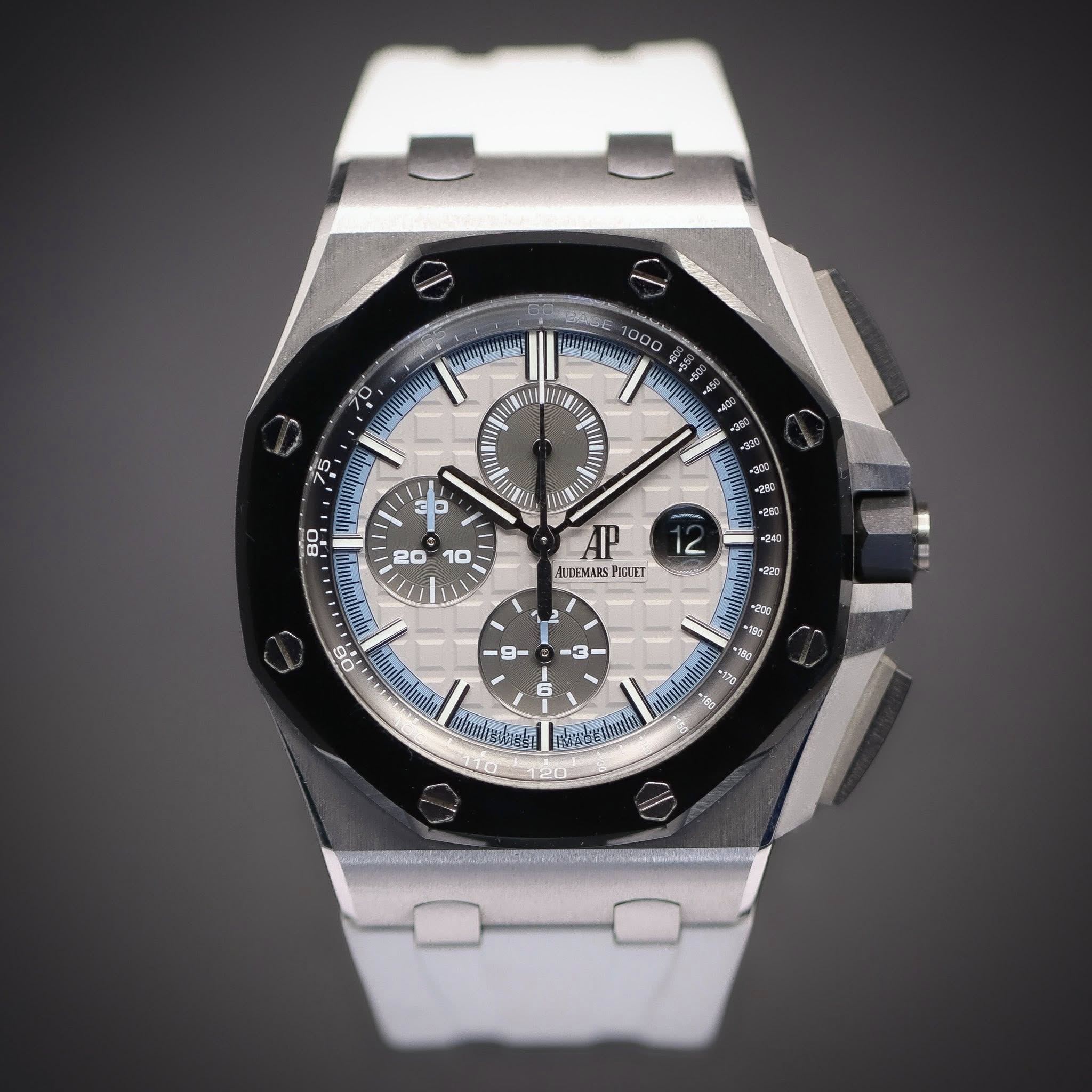 May be an image of wrist watch and text