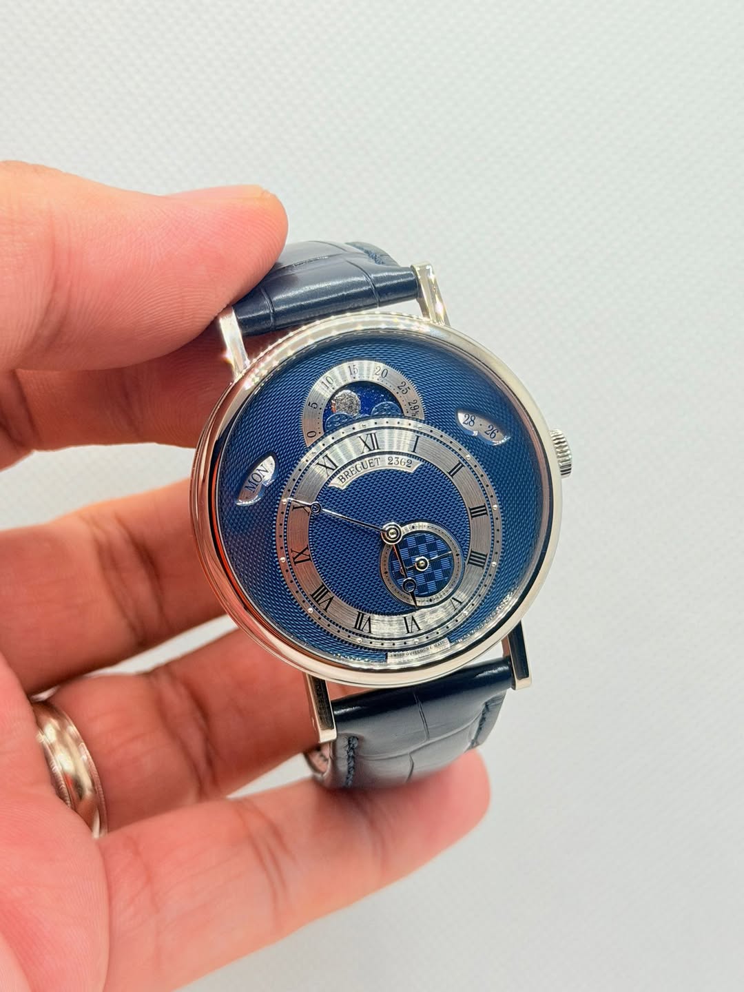 May be an image of digital watch and text