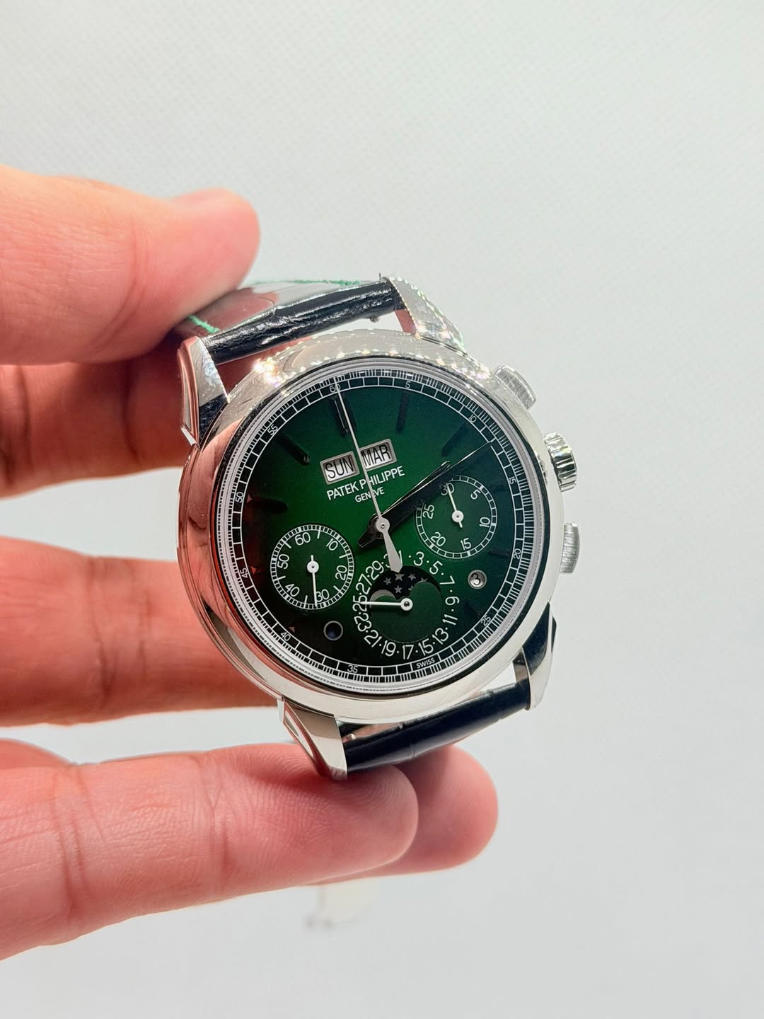 May be an image of digital watch, map and text
