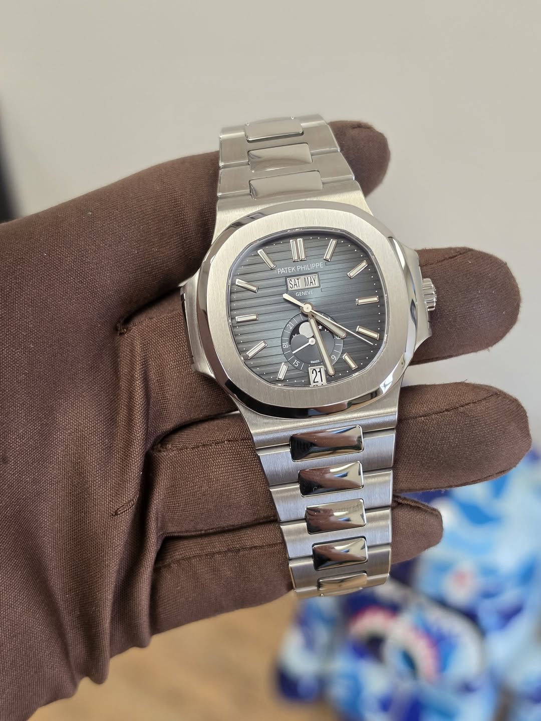 May be an image of wrist watch and text