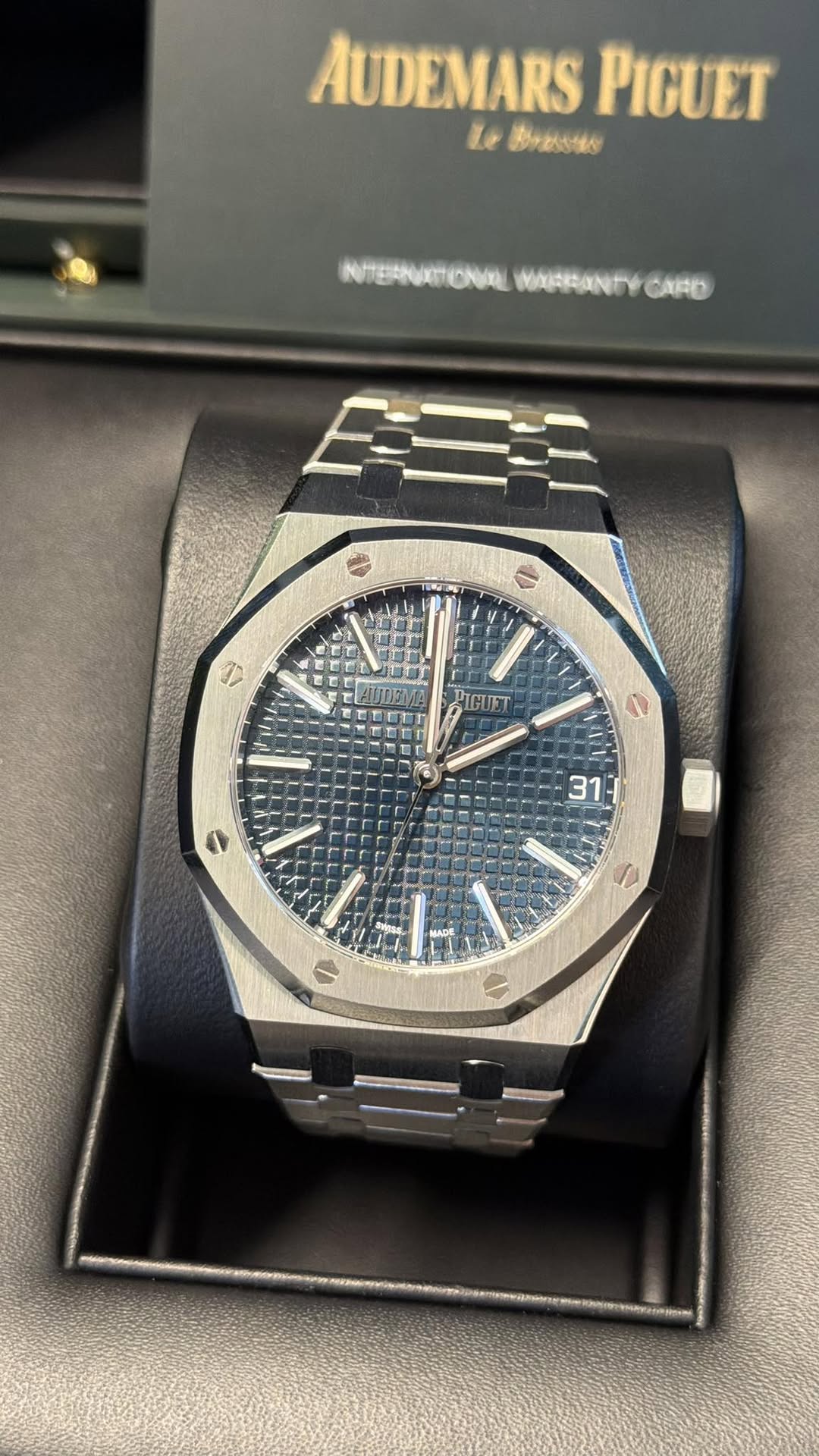 May be an image of wrist watch and text
