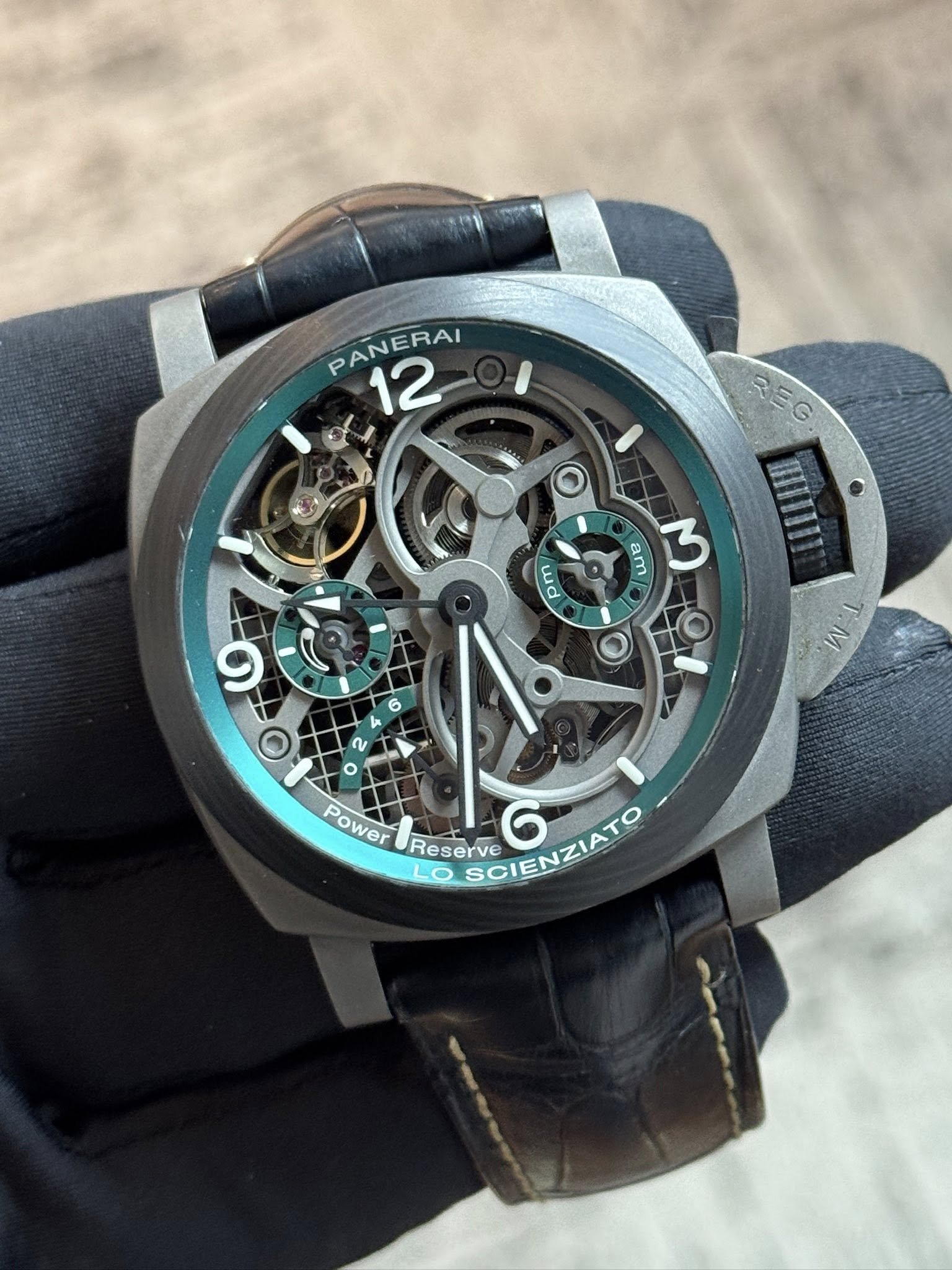 May be an image of wrist watch and text that says 'PANERAI 12 REG 자 税 am ل ud 6 ٥ 1 Μ 2 o Power Reserve SCIENZIATO 6 LO'