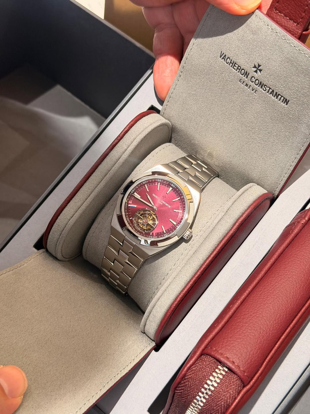 May be an image of wrist watch and text