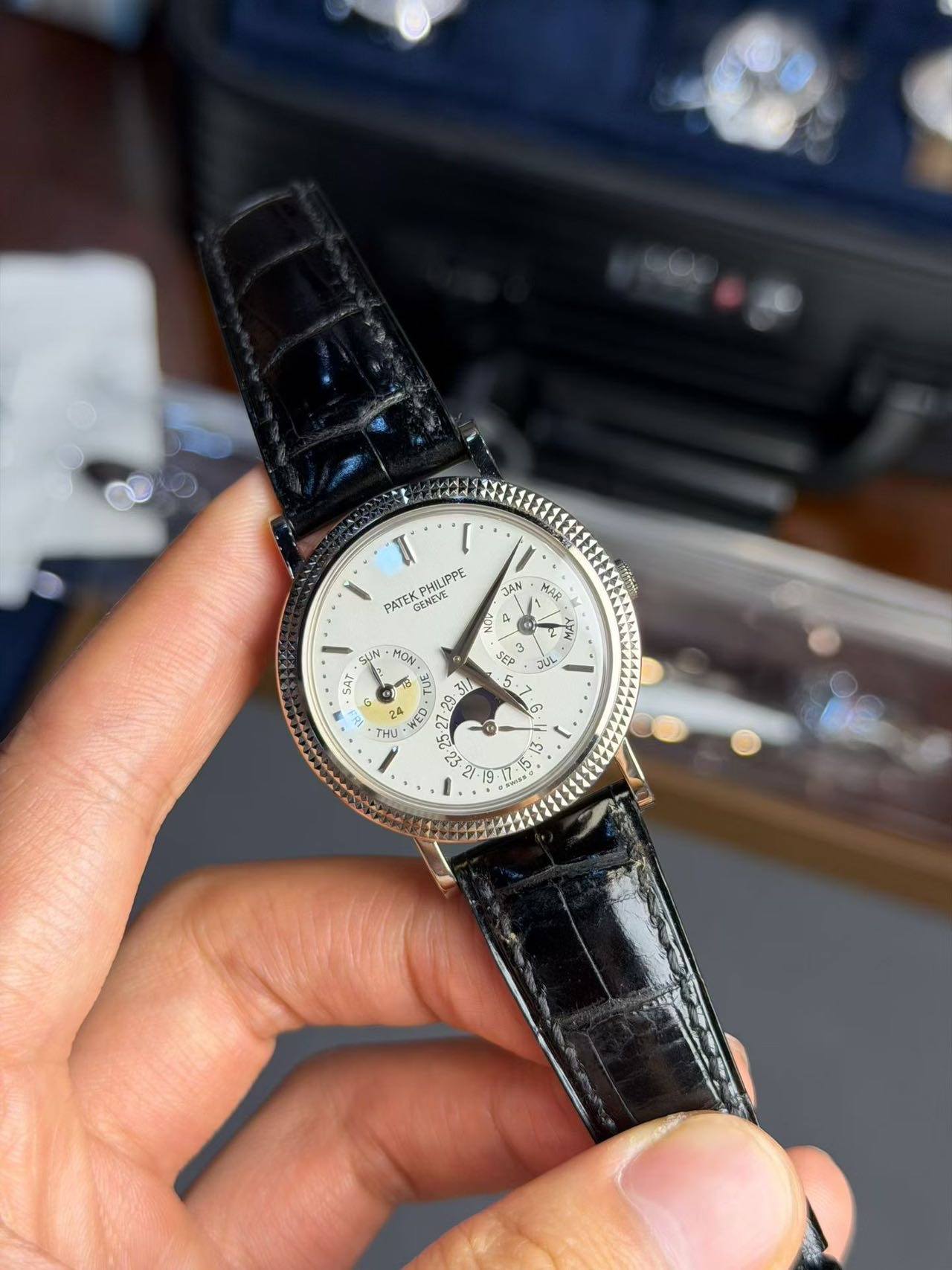 May be an image of wrist watch and text