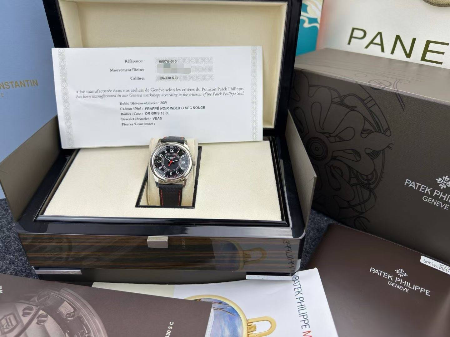May be an image of wrist watch and text that says 'Rifirence: 6007G-010 Meuvemen/ Belte STANTIN Calibrer 注红 har 26-3308 manufactunée ans ateliers Genéve orlshors eccoraling Rubis…