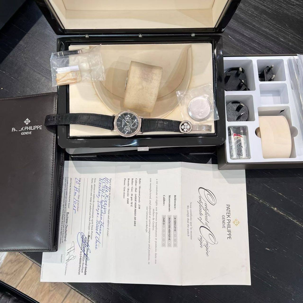 May be an image of wrist watch and text