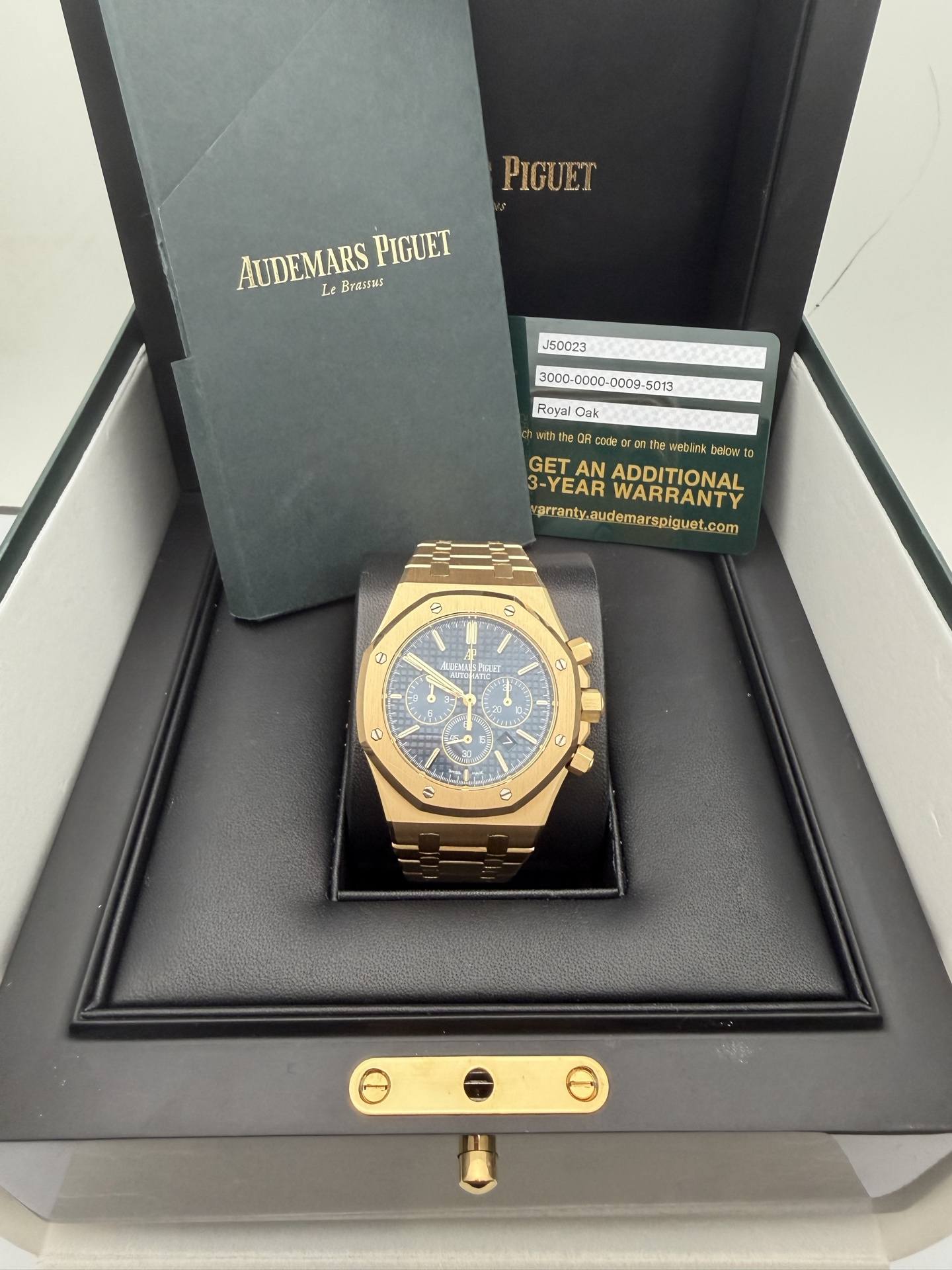 May be an image of wrist watch and text that says 'PIGUET AUDEMARS AUDEMARSPIGUET Lt Brasrui PIGUET J50023 300D-C000- Royai Dak waththg code gram ከበ Iie Meblink beloa 0 GET AN…