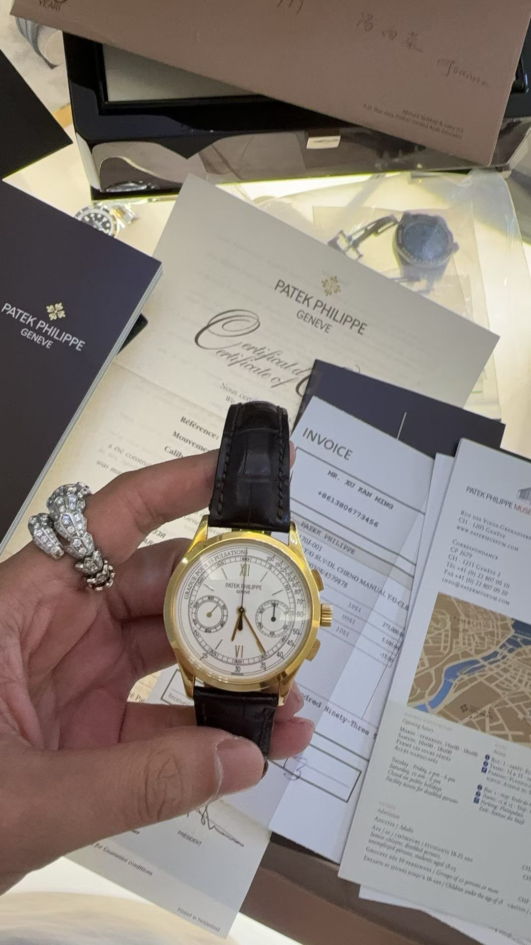 May be an image of wrist watch and text