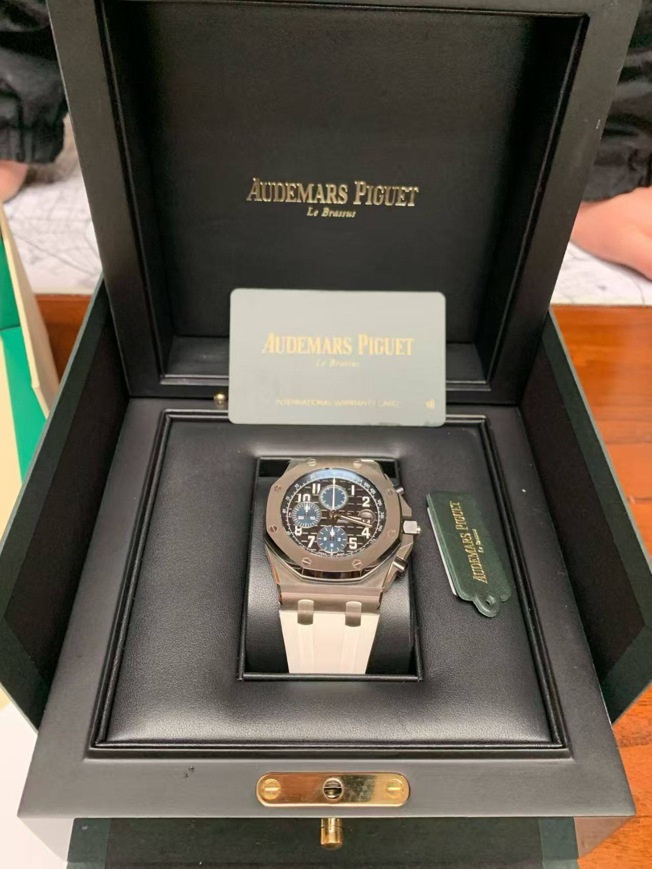 May be an image of wrist watch and text