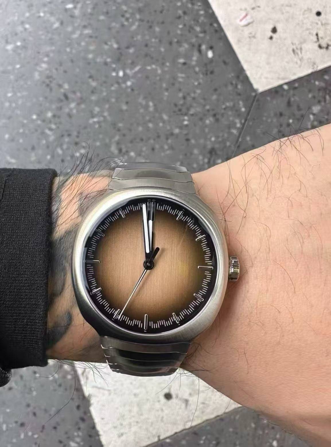 May be an image of wrist watch